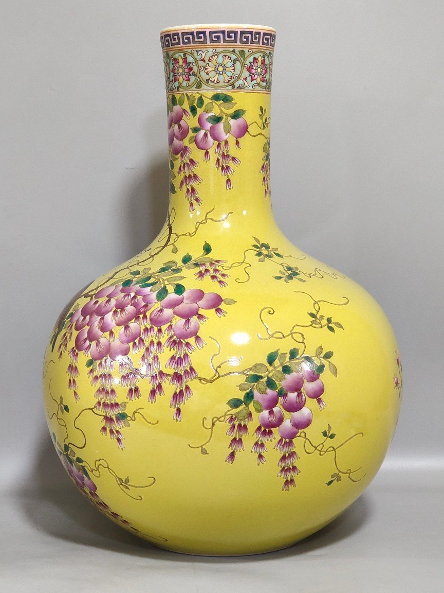 Qing Dynasty Qianlong yellow glaze flower and bird celestial vase