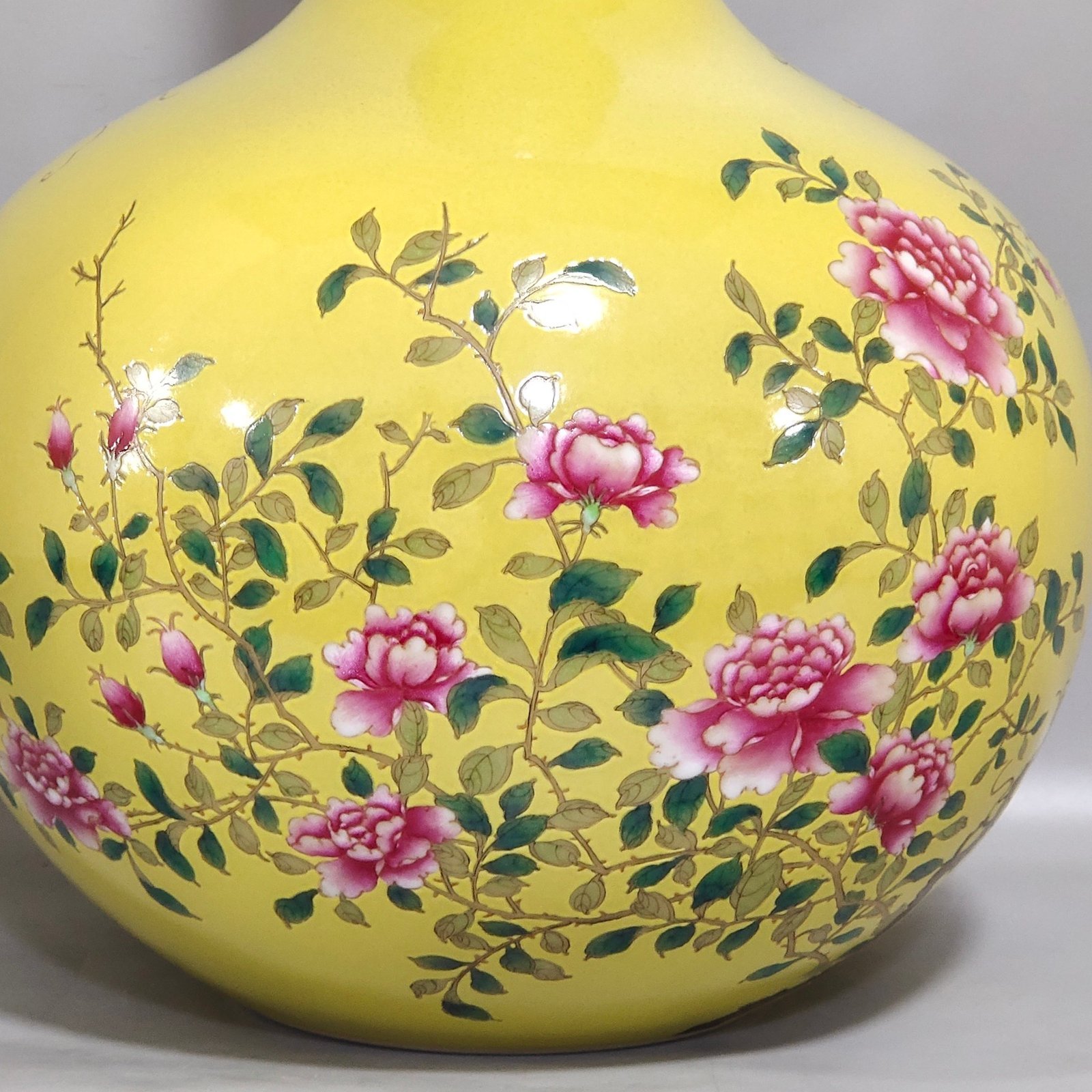 Qing Dynasty Qianlong yellow glaze flower and bird celestial vase