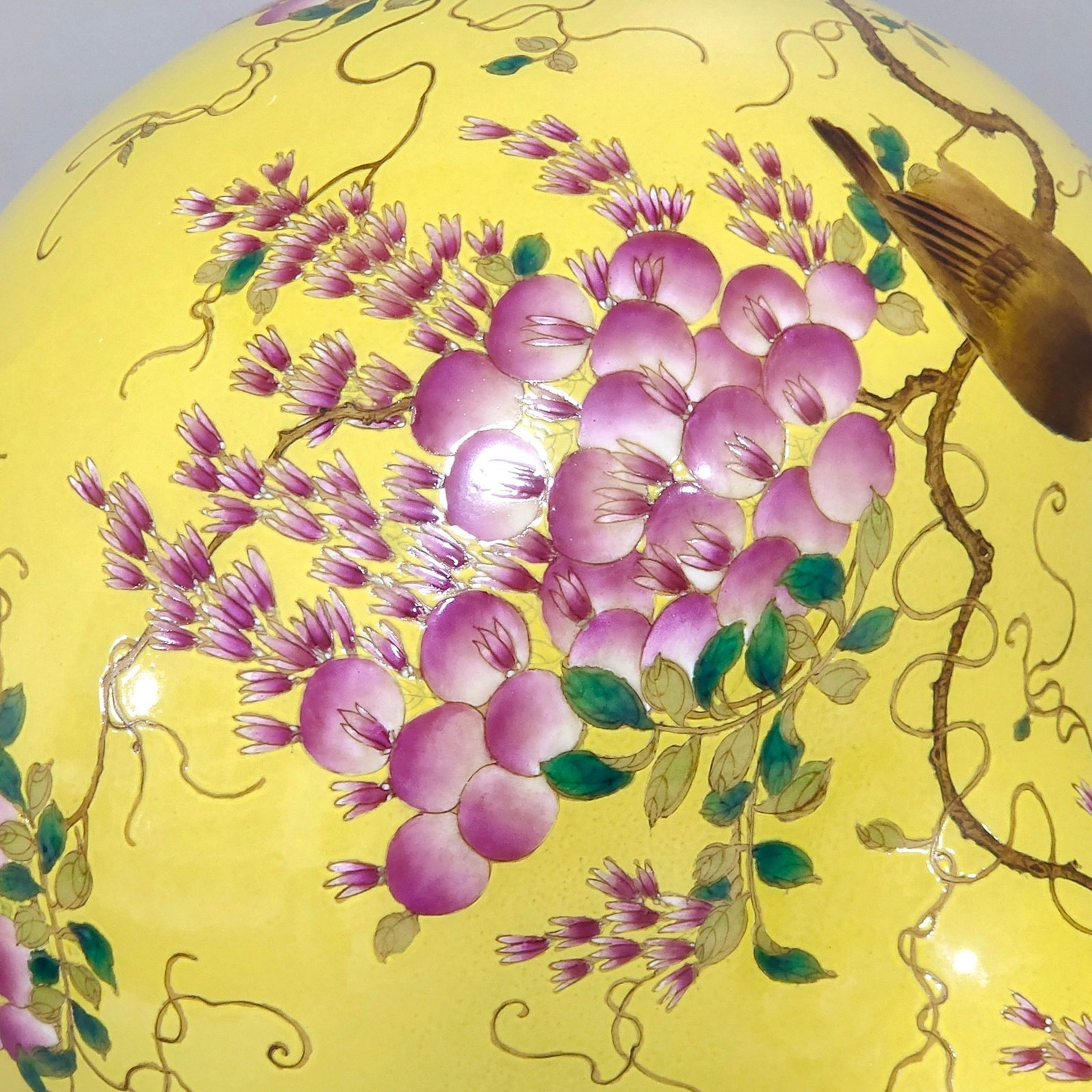 Qing Dynasty Qianlong yellow glaze flower and bird celestial vase