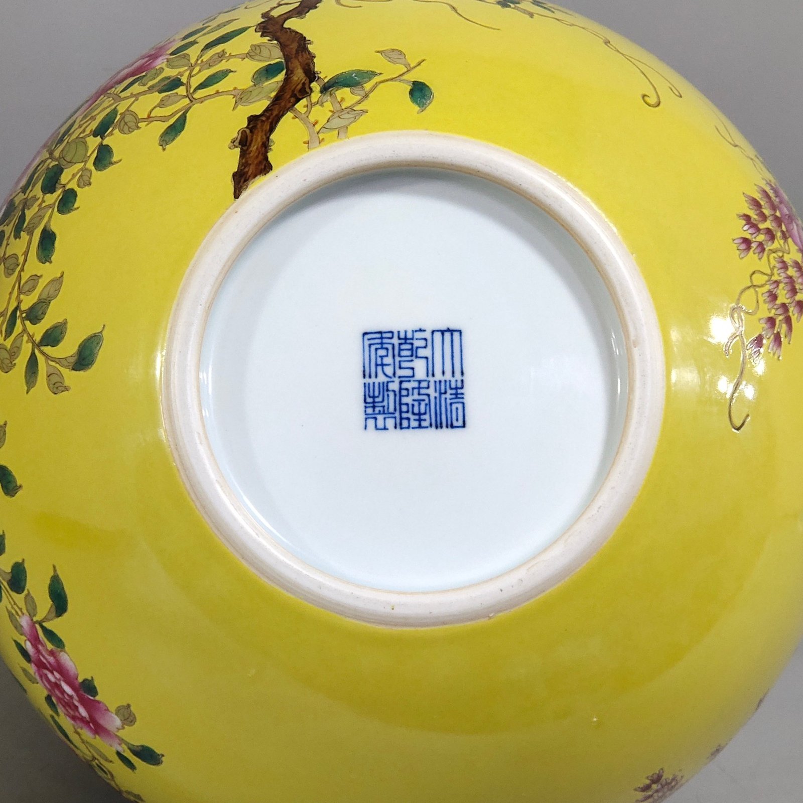 Qing Dynasty Qianlong yellow glaze flower and bird celestial vase