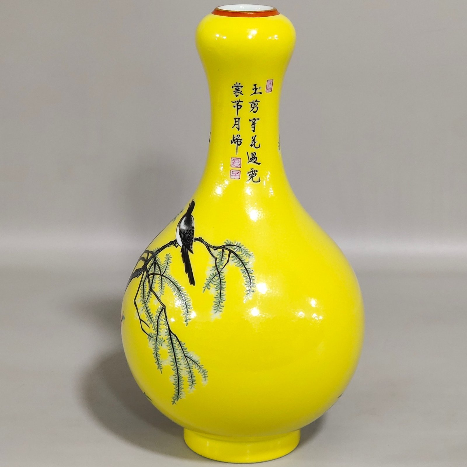 Qing Dynasty Qianlong yellow-glazed garlic vase with poems about flowers and birds