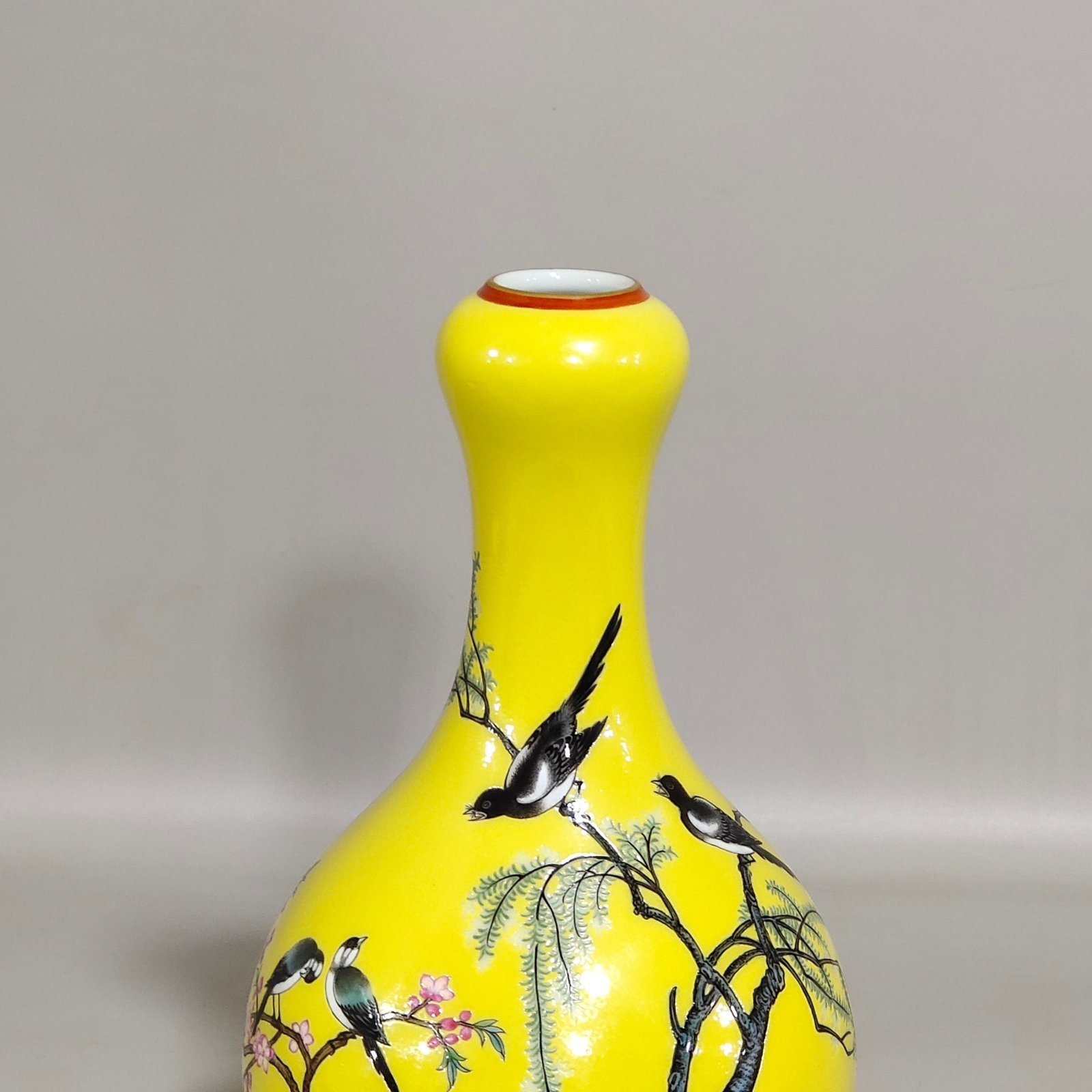Qing Dynasty Qianlong yellow-glazed garlic vase with poems about flowers and birds