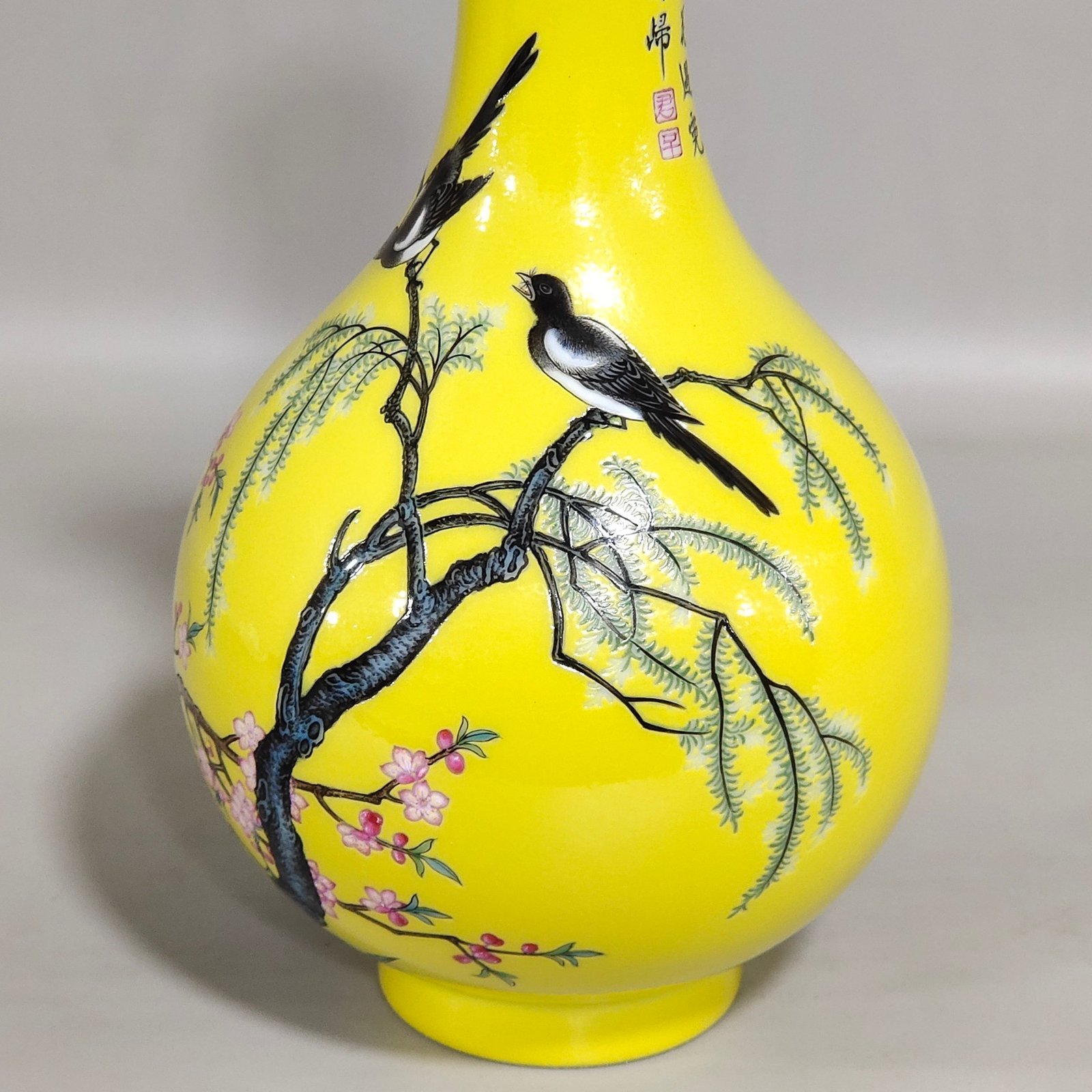Qing Dynasty Qianlong yellow-glazed garlic vase with poems about flowers and birds