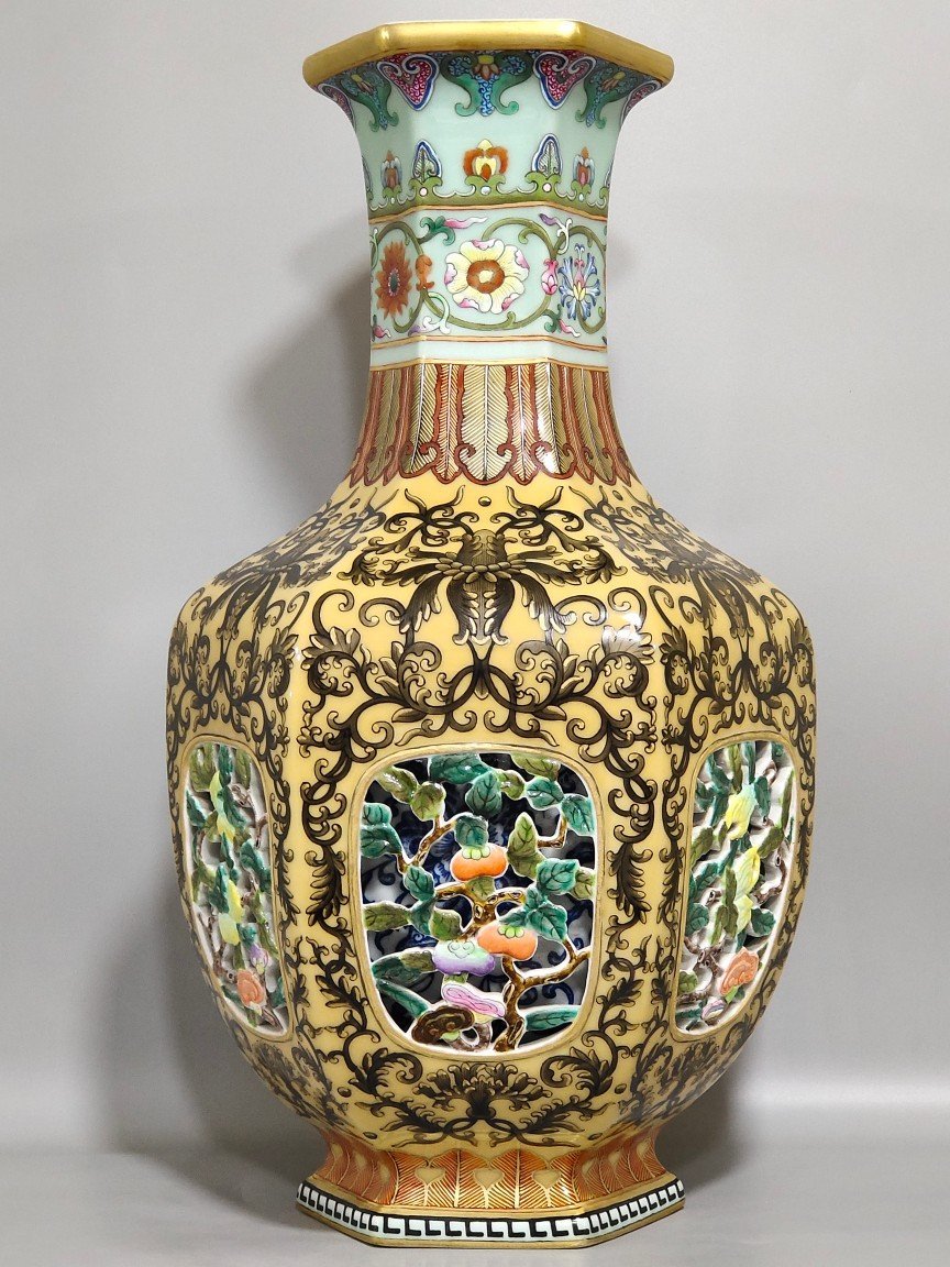 Qing Dynasty Qianlong yellow glaze hollow inner blue and white hexagonal vase