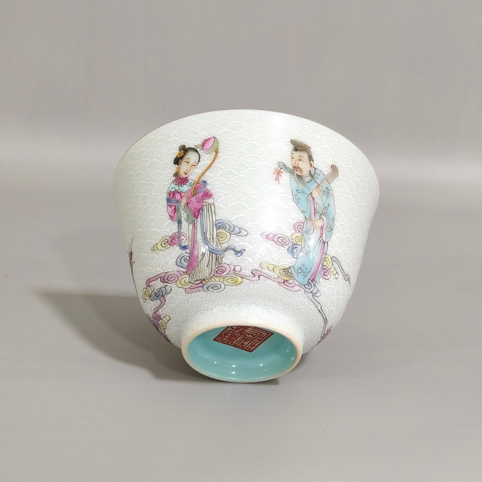 Qing Dynasty Jiaqing carvings with sea water pattern and Eight Immortals crossing the sea cup