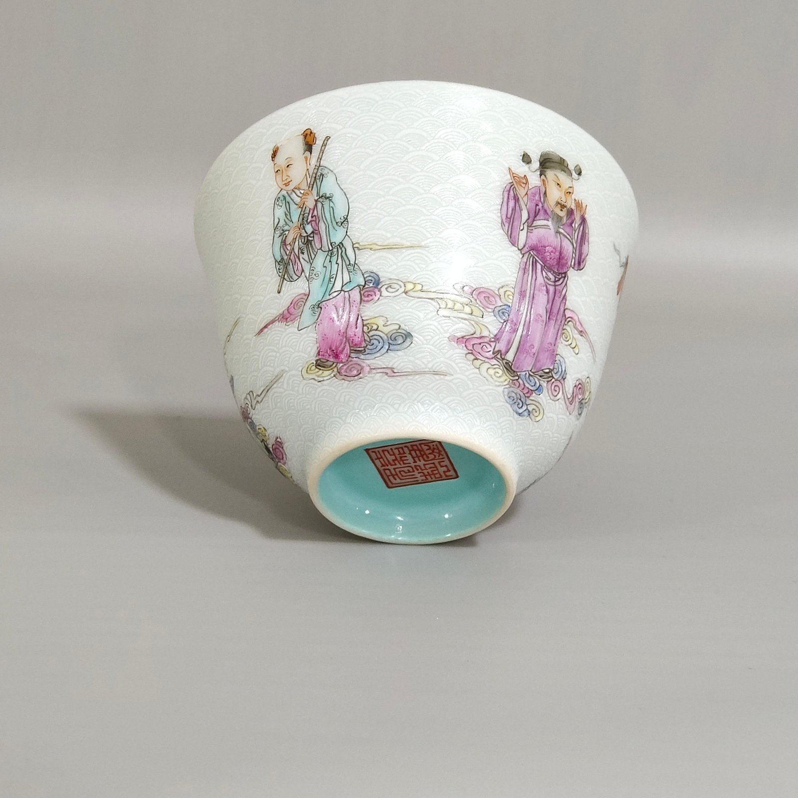 Qing Dynasty Jiaqing carvings with sea water pattern and Eight Immortals crossing the sea cup