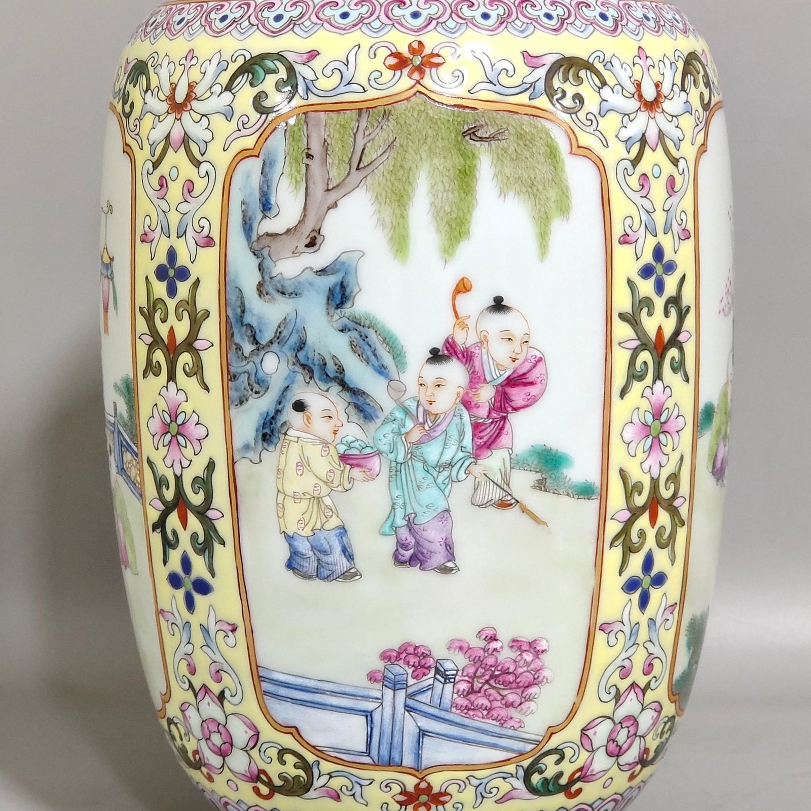 Qing Dynasty Jiaqing yellow ground window lantern vase with baby playing