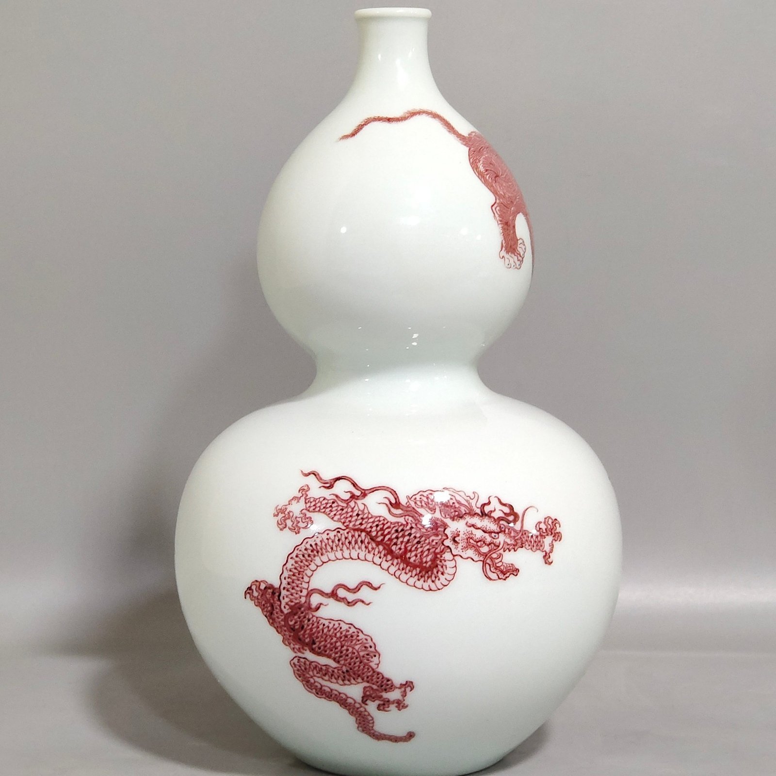 Qing Dynasty Kangxi underglaze red animal gourd bottle