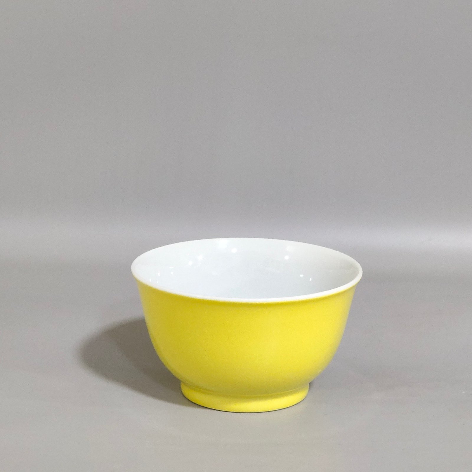 Qing Dynasty Kangxi lemon yellow glaze painted peach cup
