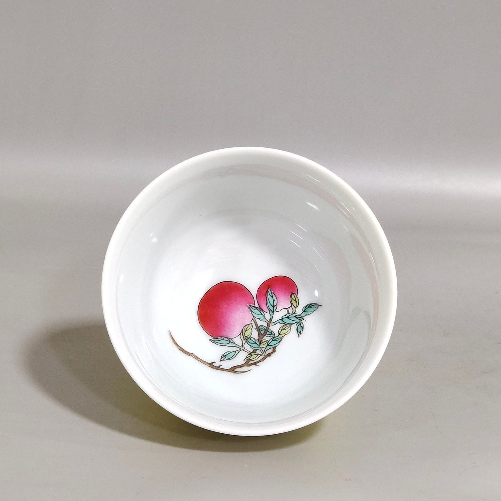 Qing Dynasty Kangxi lemon yellow glaze painted peach cup