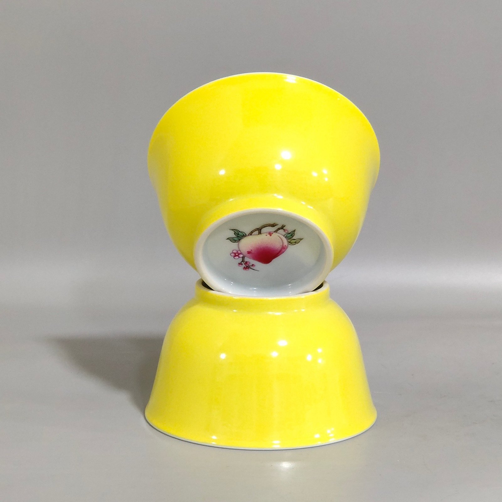 Qing Dynasty Kangxi lemon yellow glaze painted peach cup