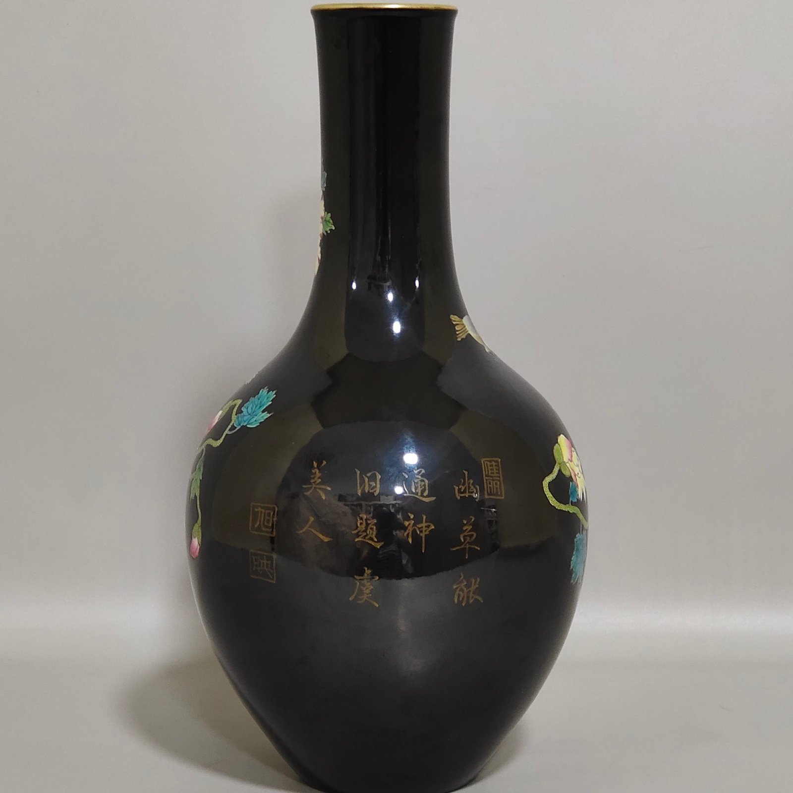 Qing Dynasty Yongzheng black gold glaze poppy poem olive vase