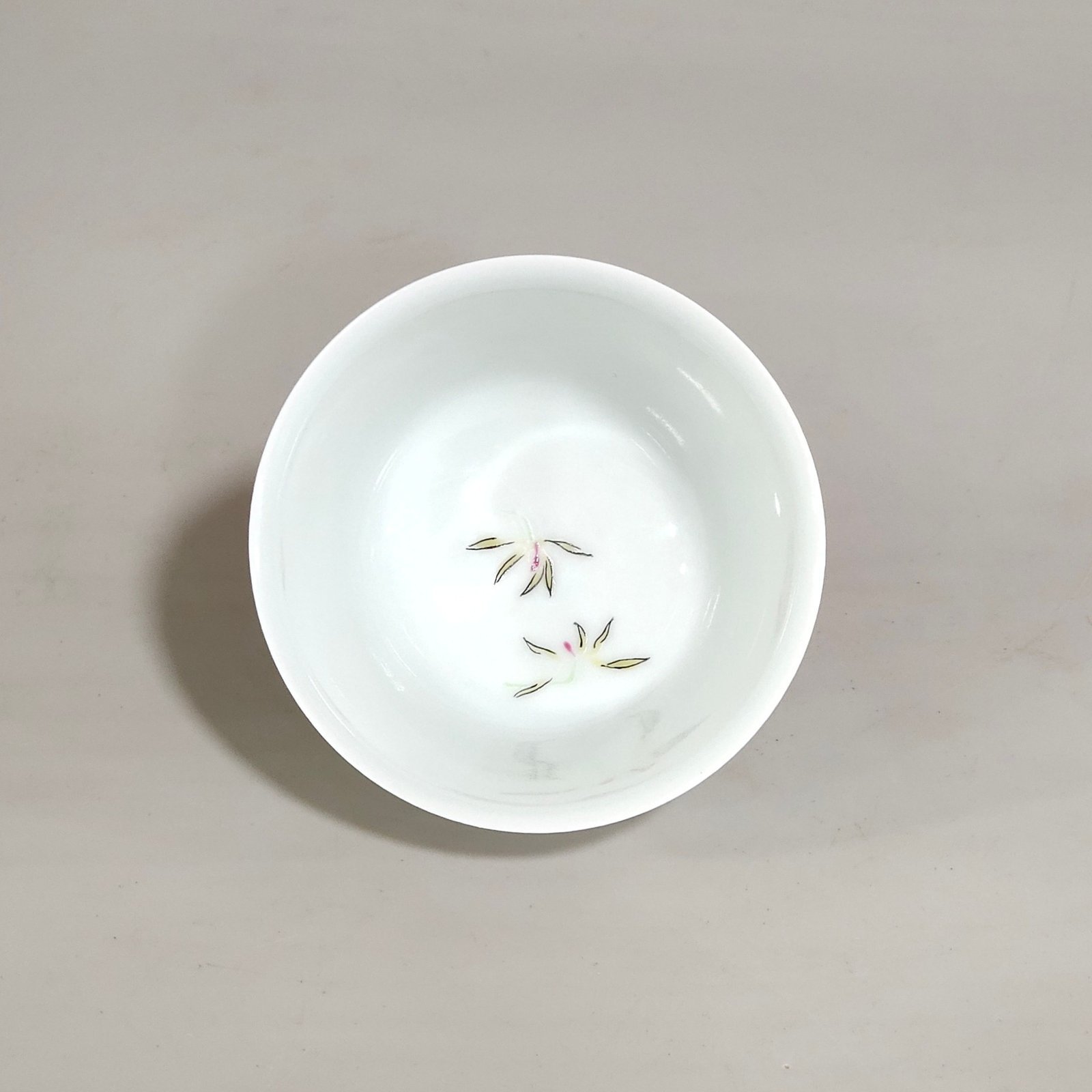 Qing Dynasty Yongzheng A pair of cups with inner orchid and outer butterfly love pattern