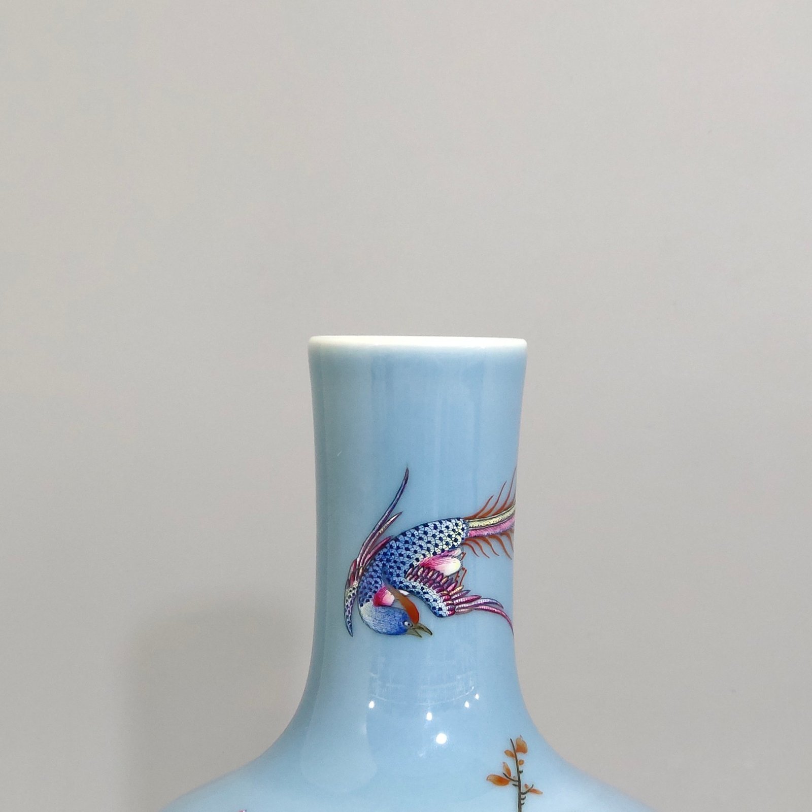Qing Dynasty Yongzheng sky blue glazed flower inscribed celestial sphere vase