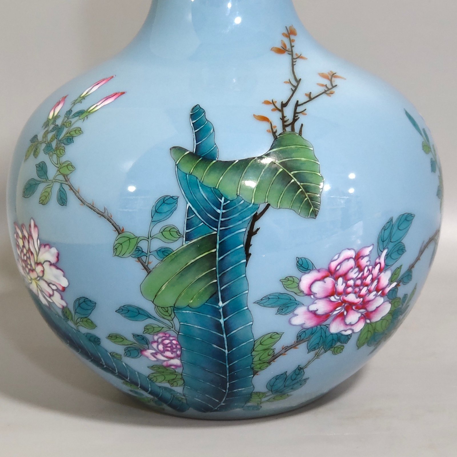Qing Dynasty Yongzheng sky blue glazed flower inscribed celestial sphere vase