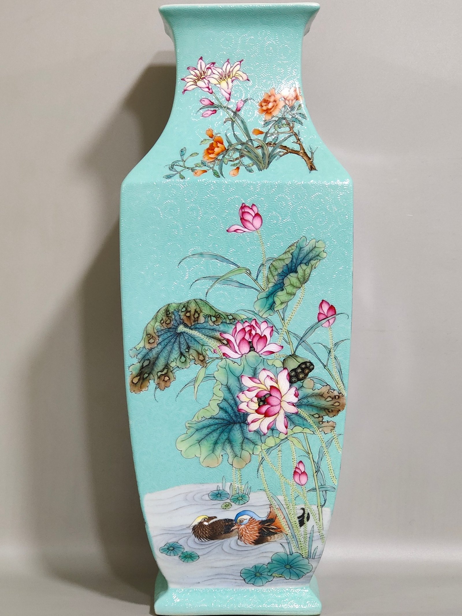Qing Dynasty Yongzheng carved turquoise green four season flower and bird square vase