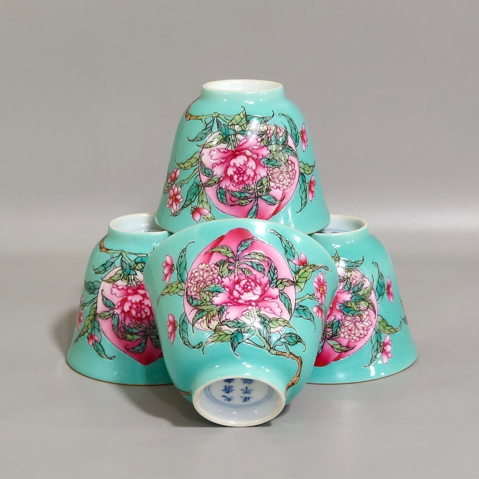 Qing Dynasty Yongzheng turquoise green longevity peach and peony tea set cup