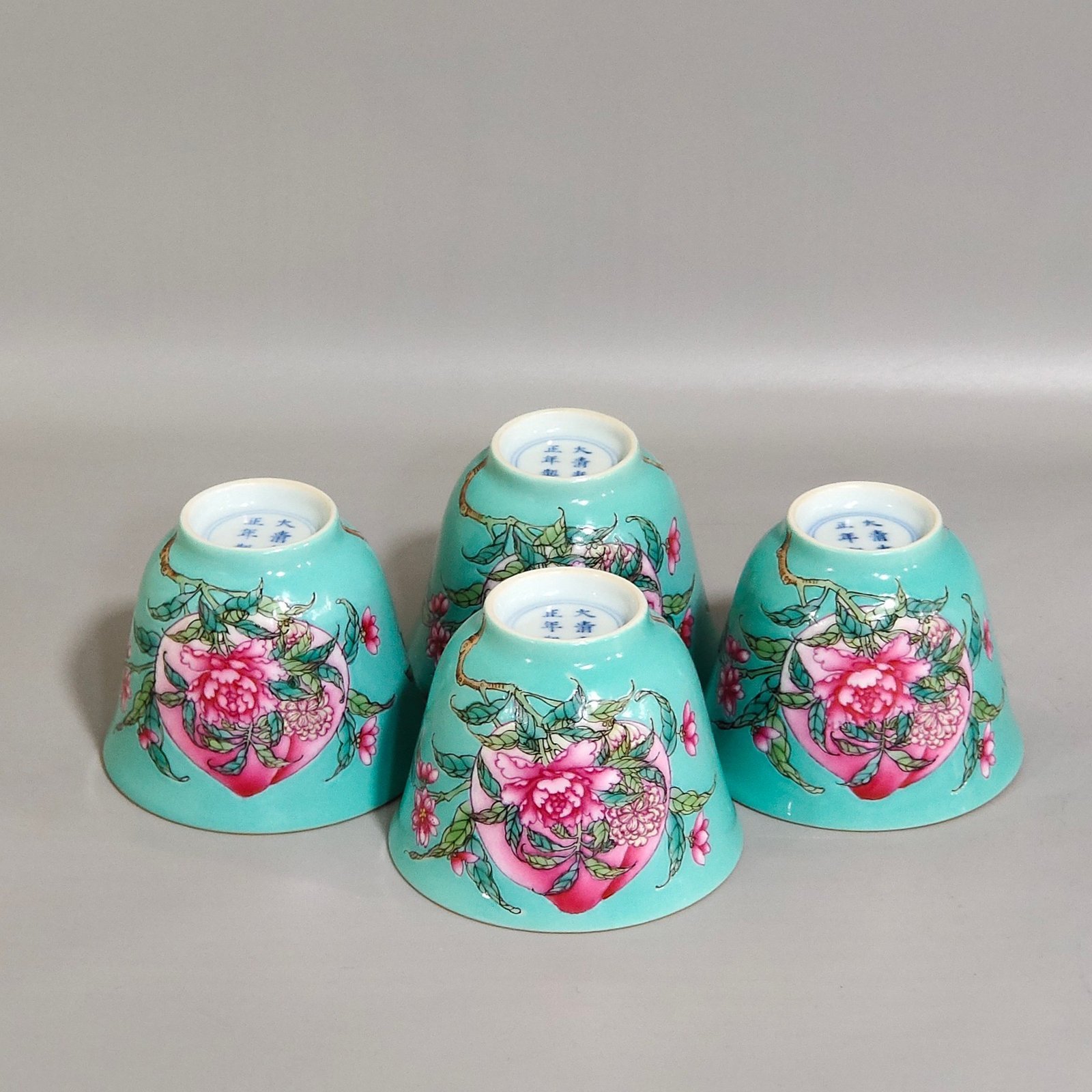 Qing Dynasty Yongzheng turquoise green longevity peach and peony tea set cup