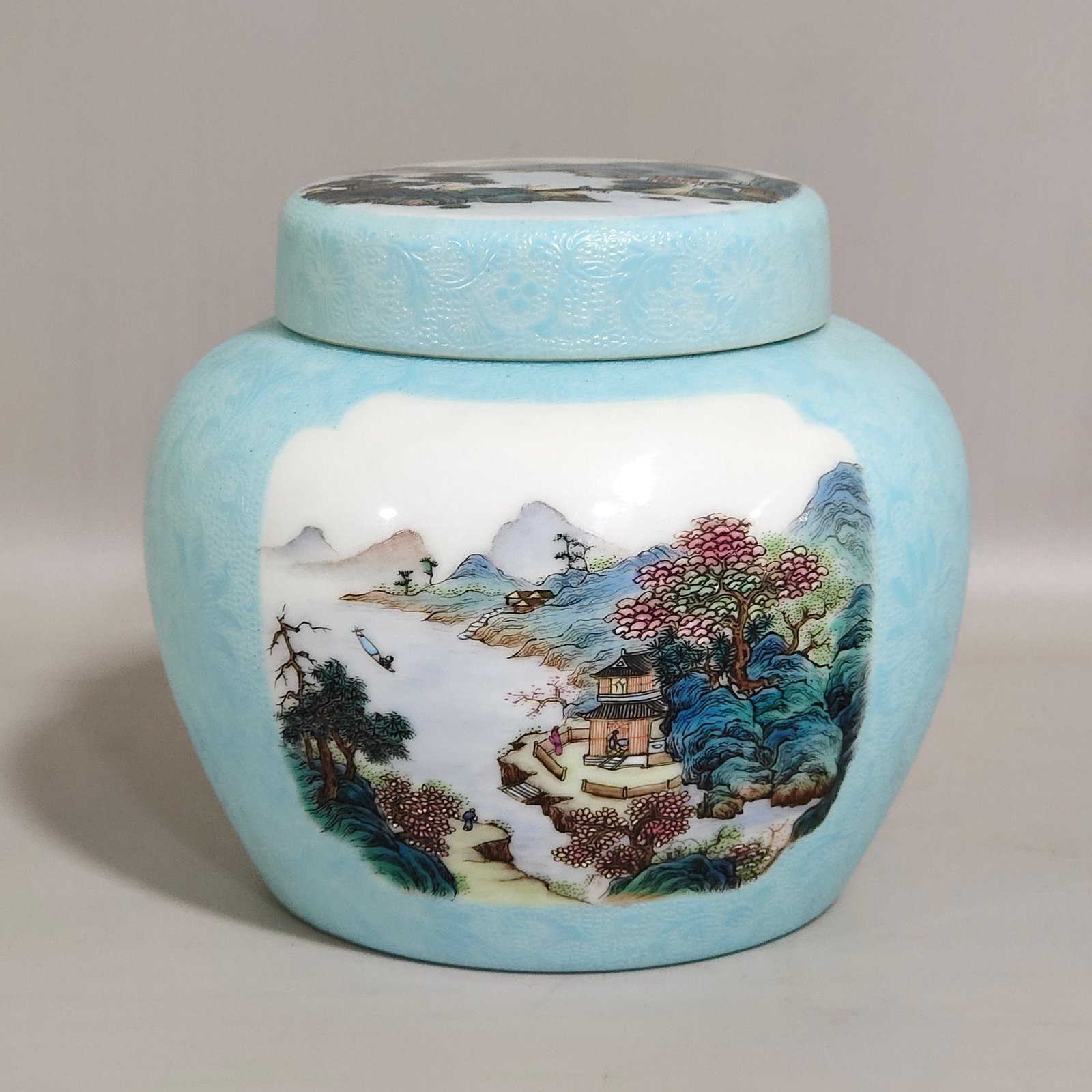 Qing Dynasty Yongzheng turquoise green flowered window landscape tea jar