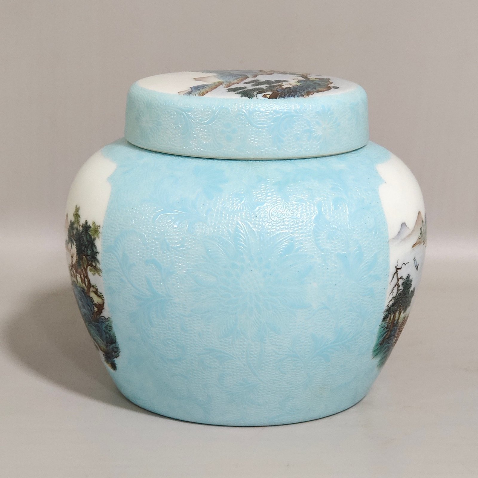 Qing Dynasty Yongzheng turquoise green flowered window landscape tea jar