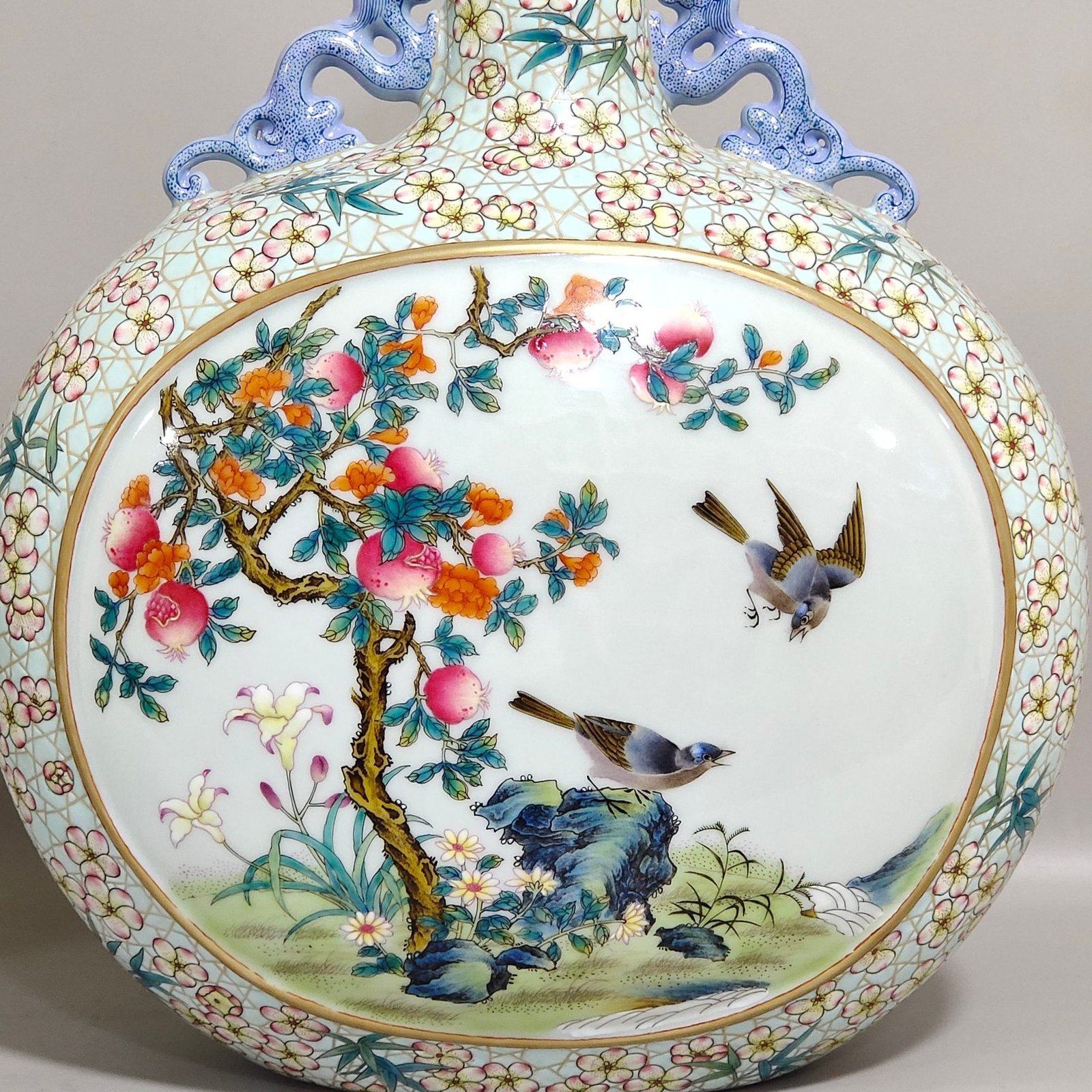 Qing Dynasty Yongzheng turquoise green plum blossom window vase with flowers and birds