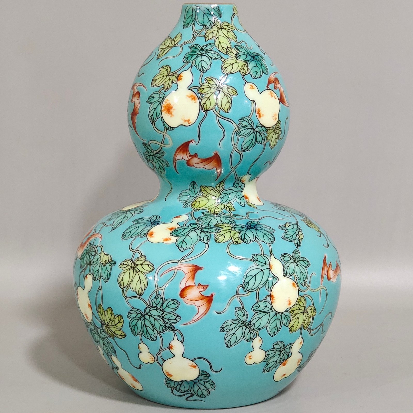 Qing Dynasty Yongzheng turquoise green glazed gourd vase with many children