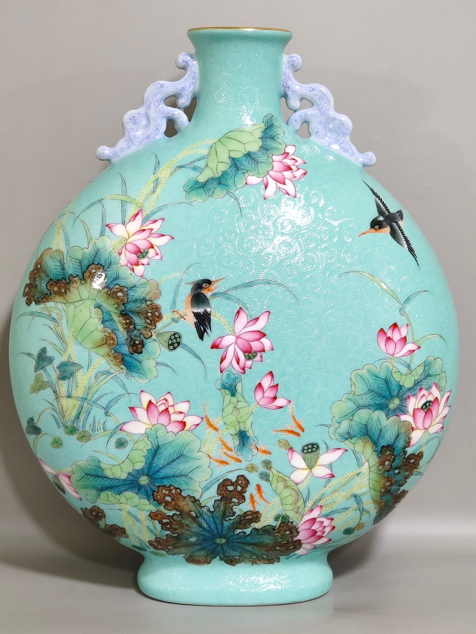 Qing Dynasty Yongzheng turquoise green glaze carved kingfisher and lotus poem vase