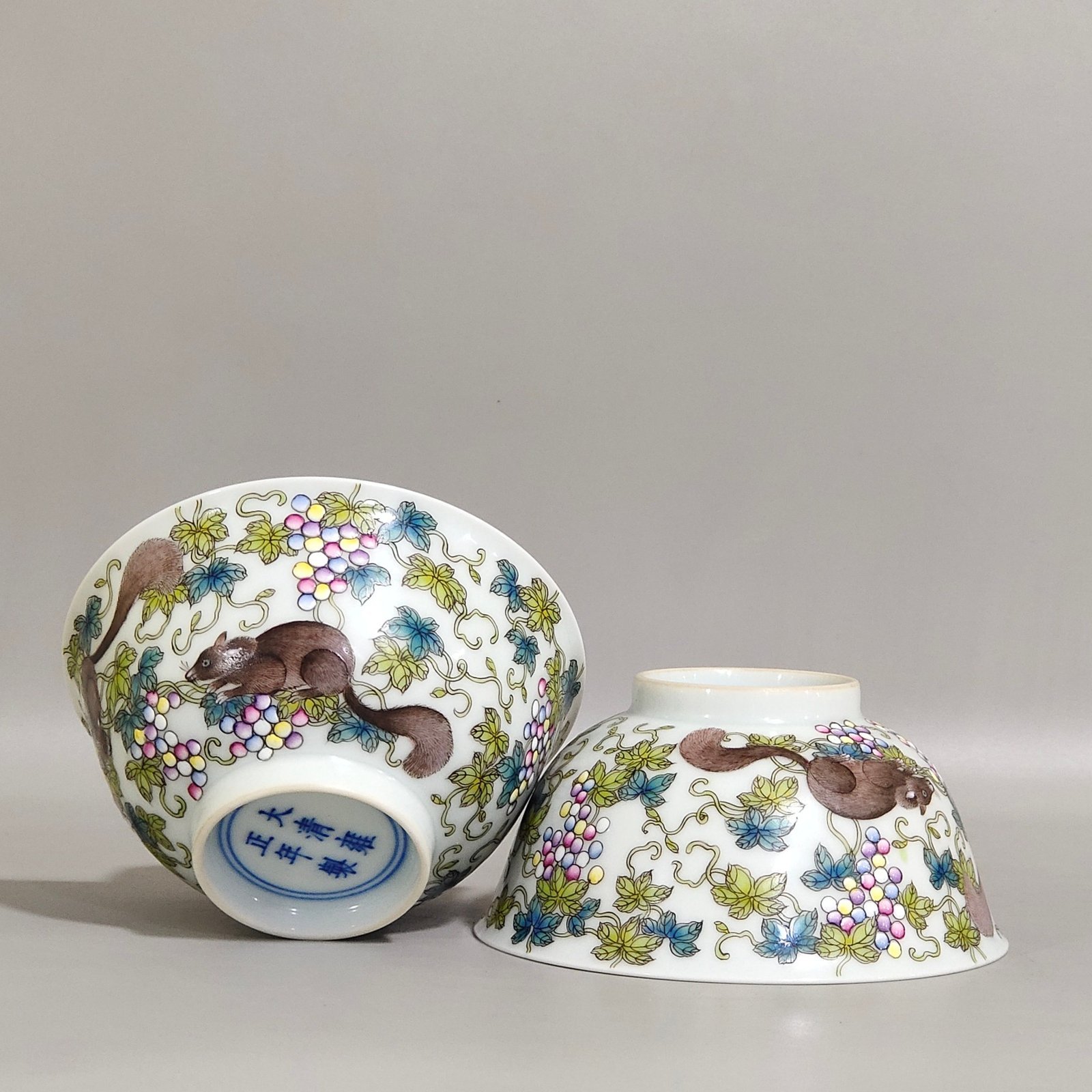 Qing Dynasty Yongzheng Painted cup with squirrel eating grapes