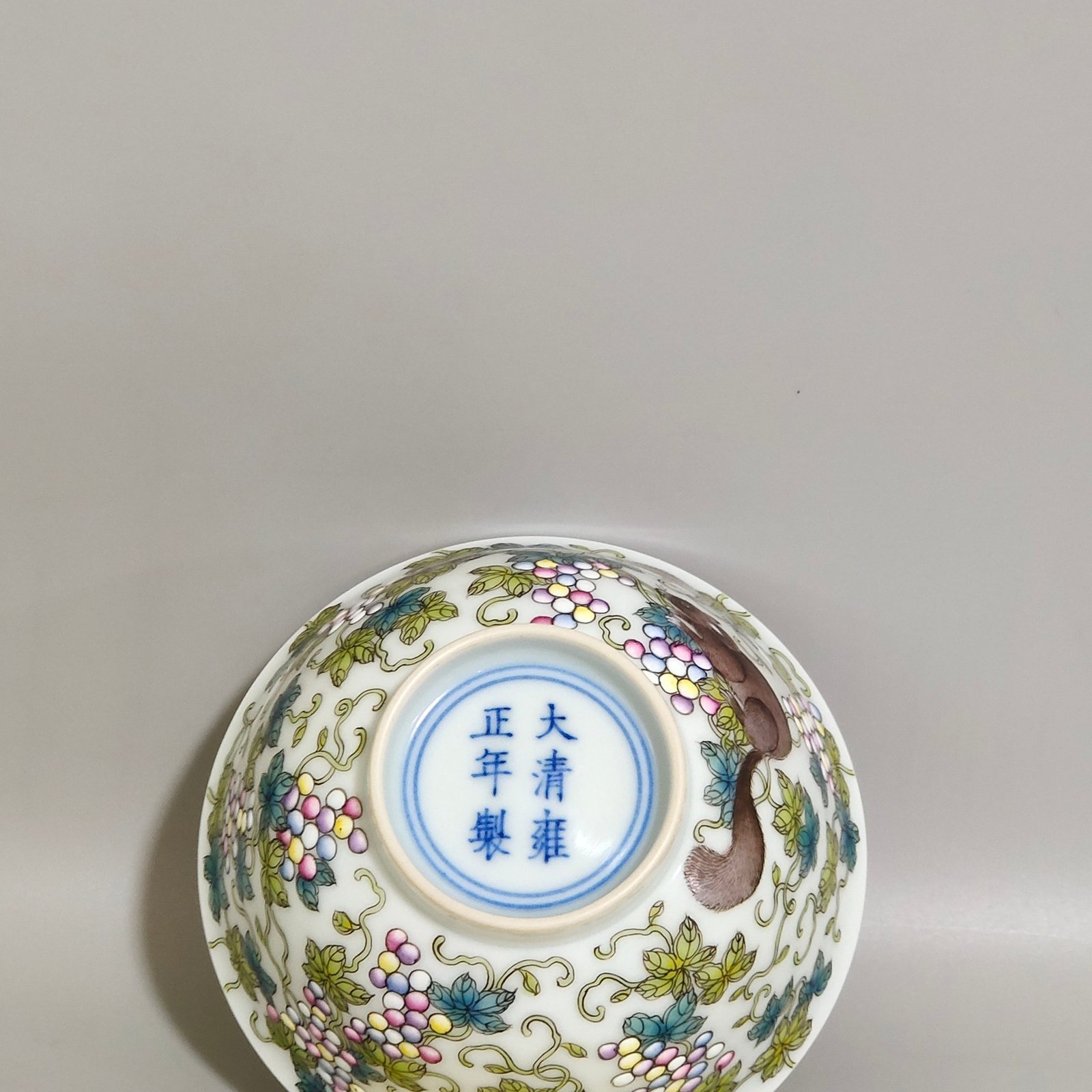 Qing Dynasty Yongzheng Painted cup with squirrel eating grapes