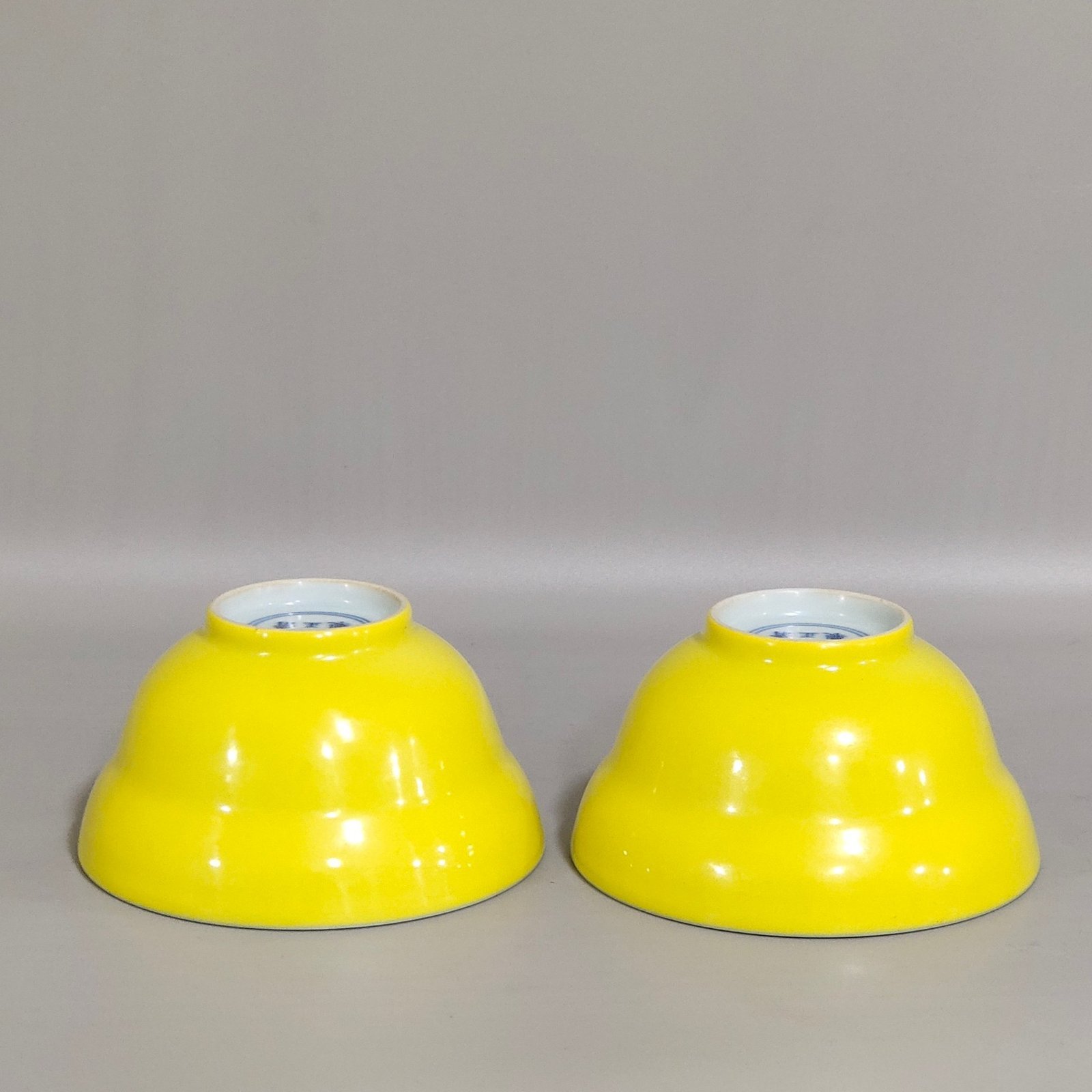 Qing Dynasty Yongzheng lemon yellow glaze folding cup with interior painting