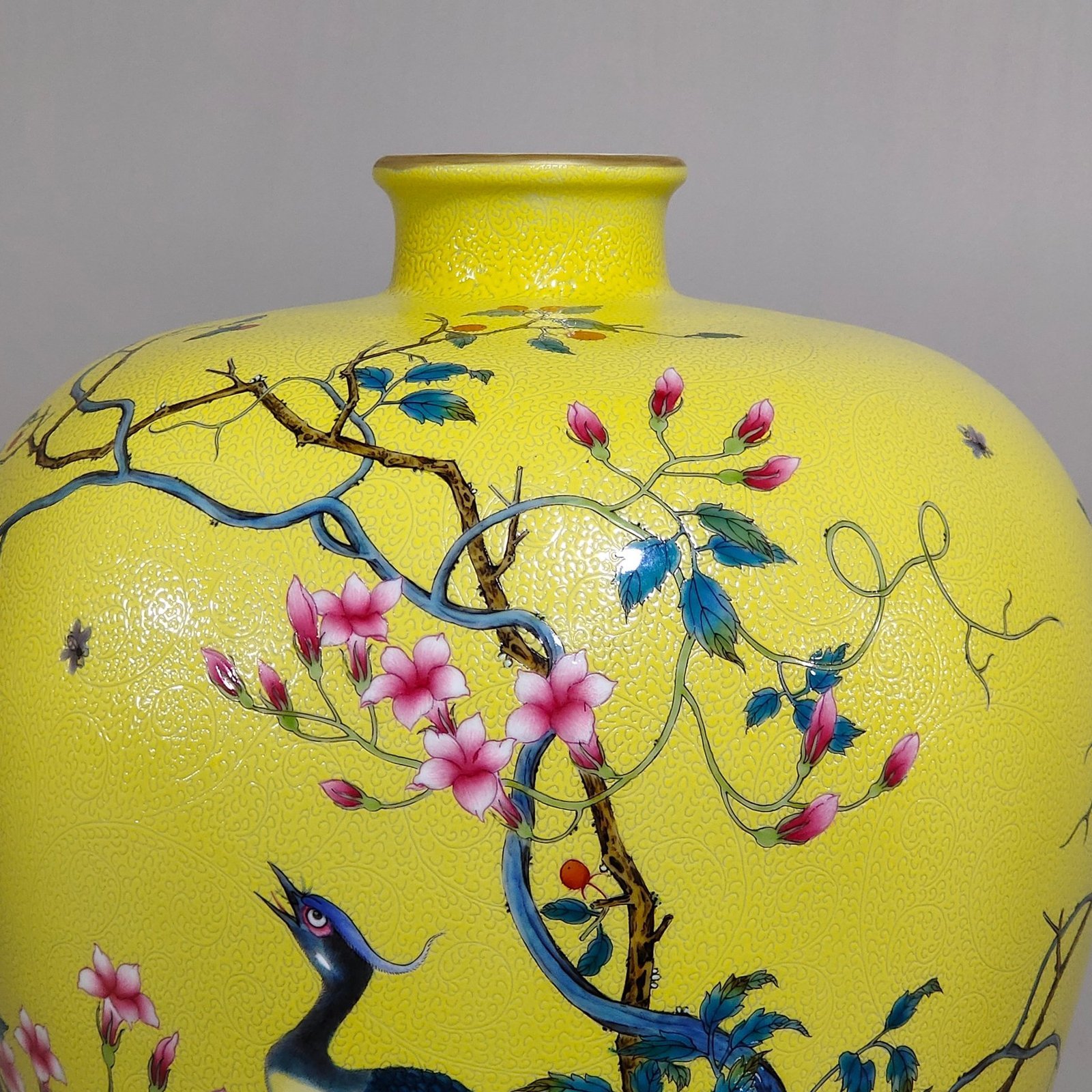 Qing Dynasty Yongzheng lemon yellow glaze grilled golden pheasant poem plum vase