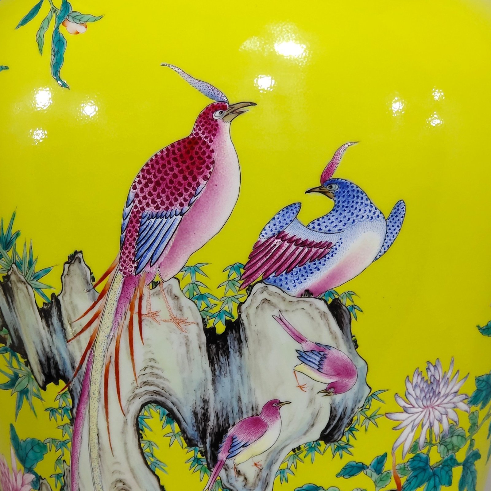 Qing Dynasty Yongzheng lemon yellow glaze flower and bird plum vase
