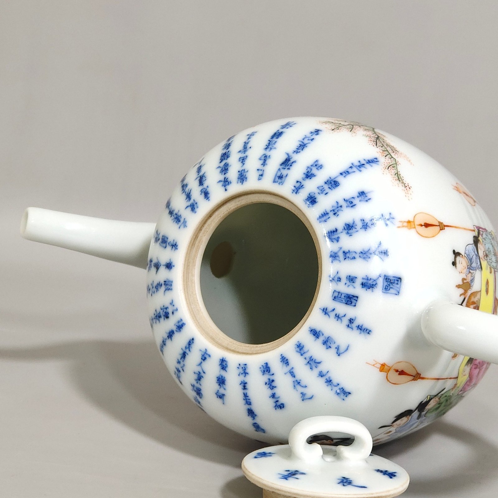 Qing Dynasty Yongzheng peach and plum night banquet teapot with poems and pictures