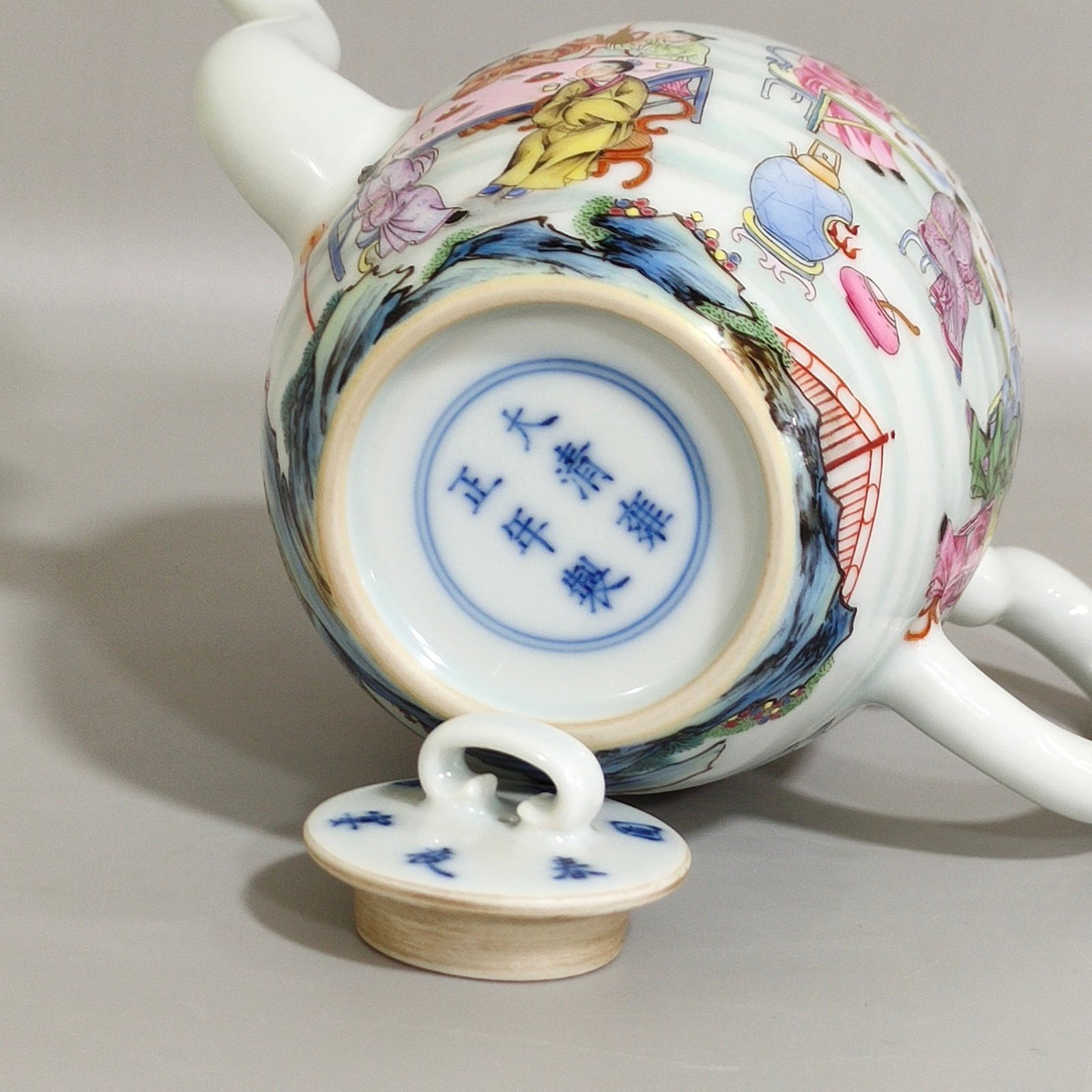 Qing Dynasty Yongzheng peach and plum night banquet teapot with poems and pictures