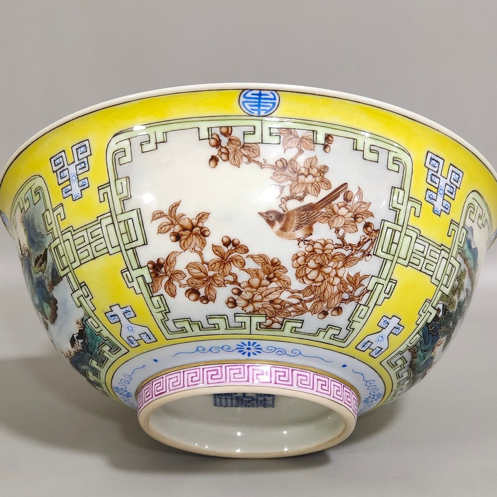 Qing Dynasty Yongzheng swallow yellow glaze flowers and birds blue and white bowl
