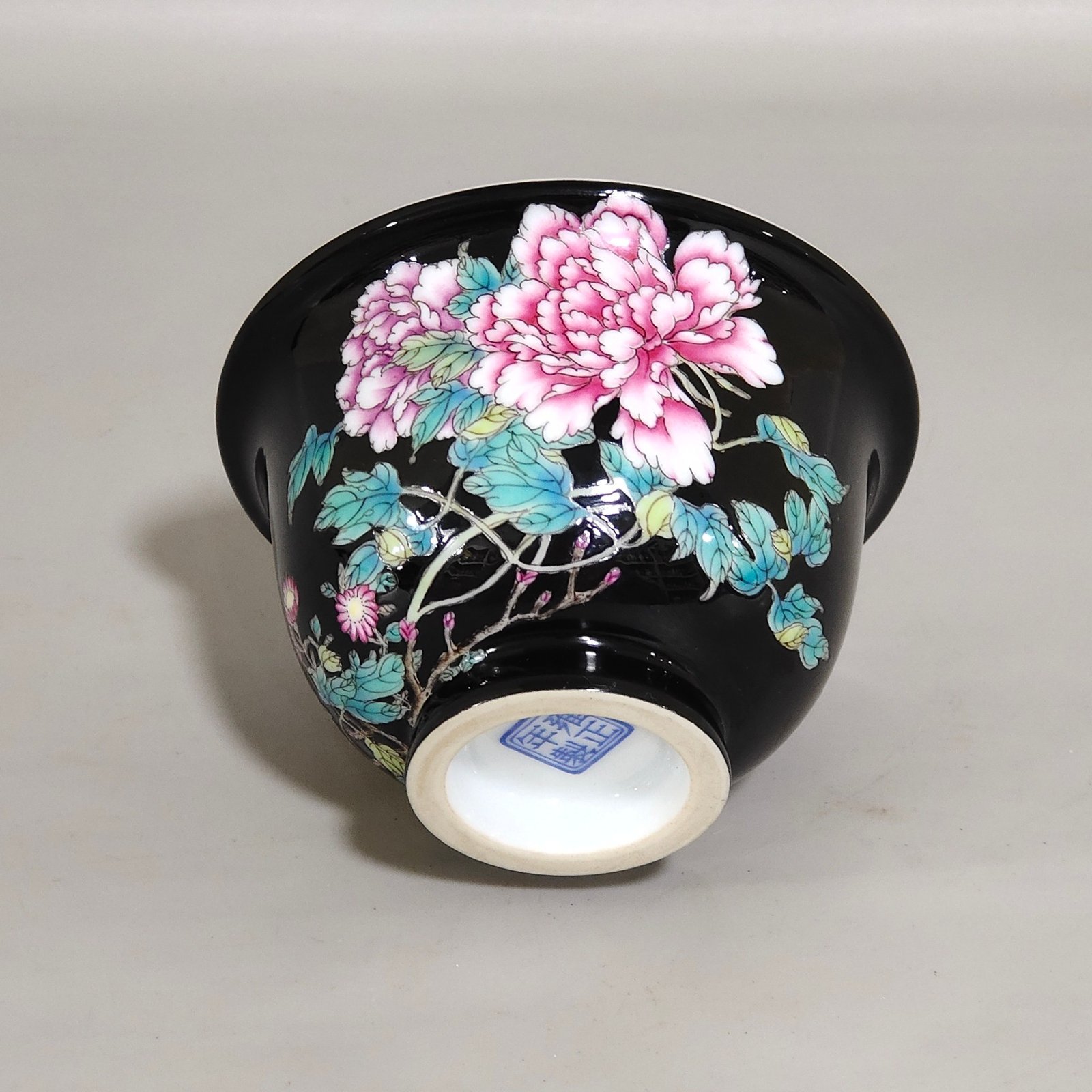 Qing Dynasty Yongzheng enamel black gold glaze peony flower poem cup