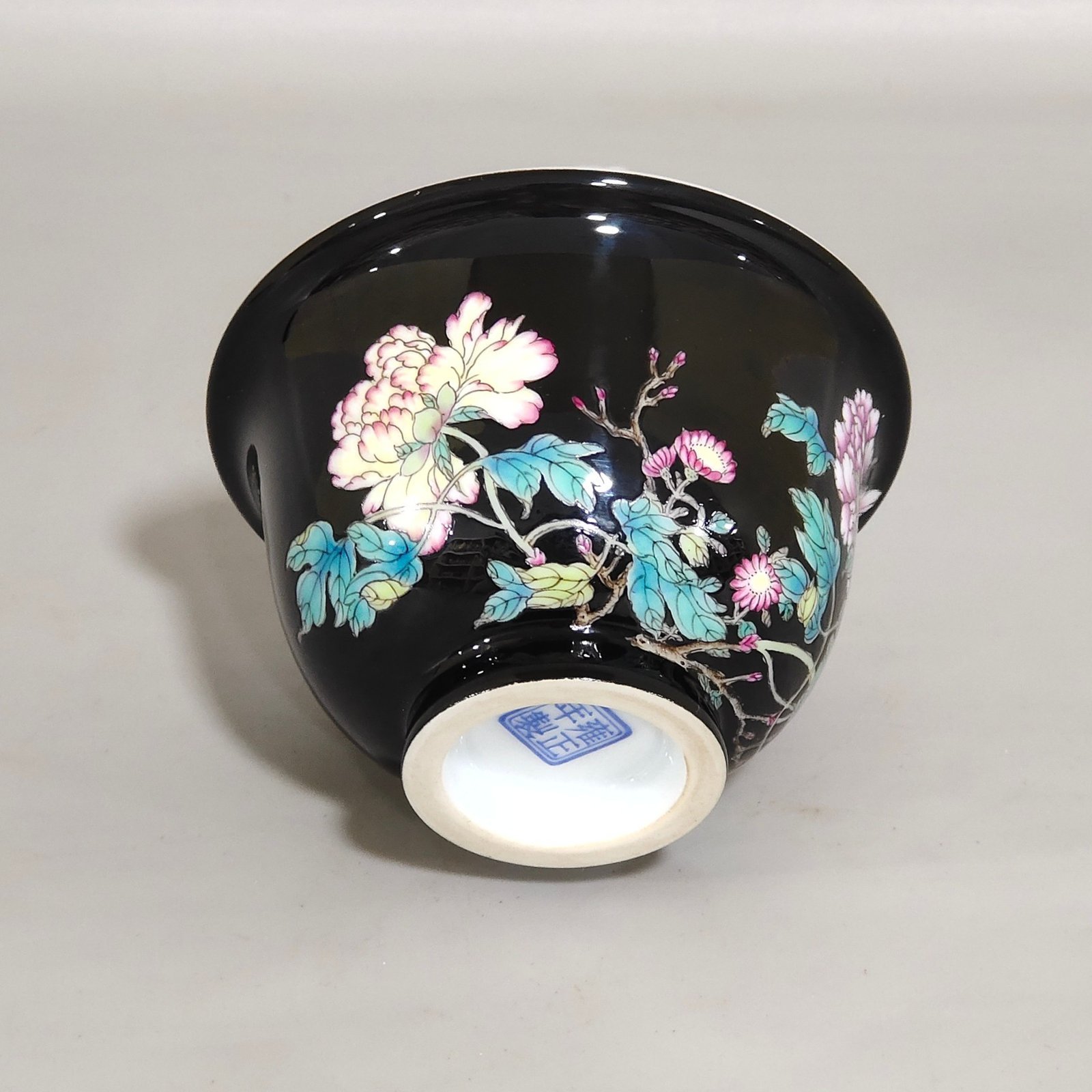 Qing Dynasty Yongzheng enamel black gold glaze peony flower poem cup