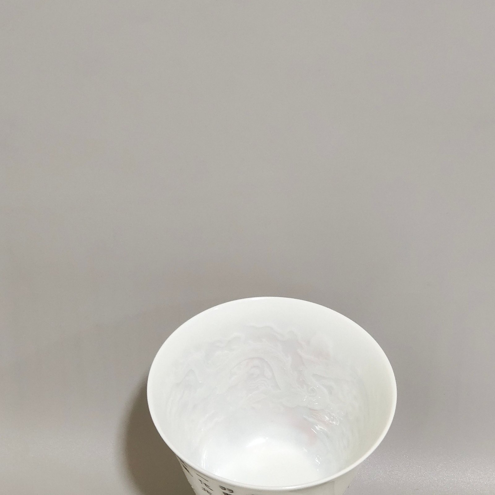 Qing Dynasty Yongzheng enamel cup with poetry inscription