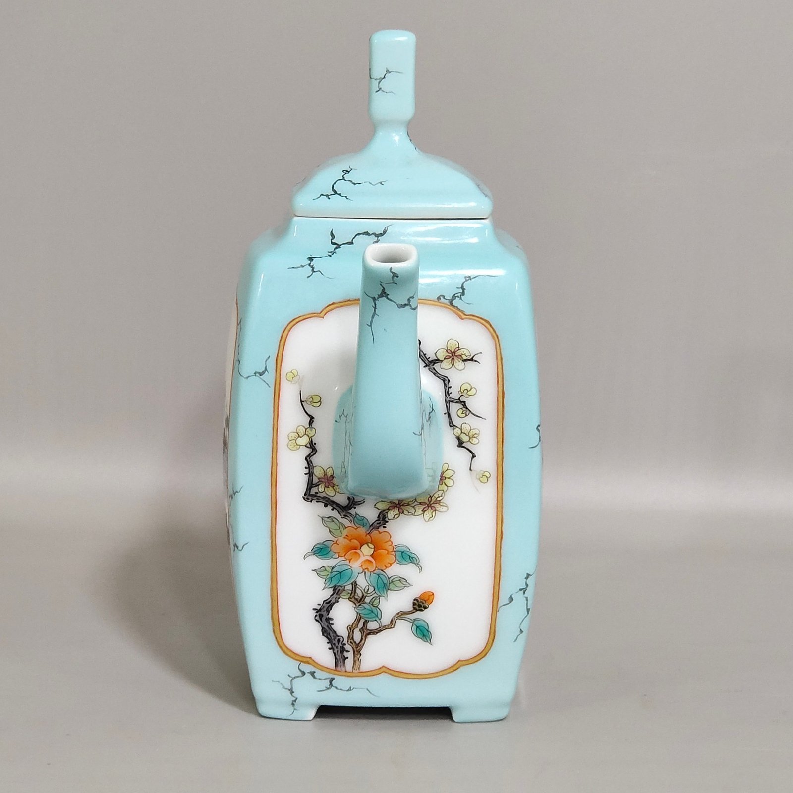 Qing Dynasty Yongzheng enamel turquoise green window landscape teapot