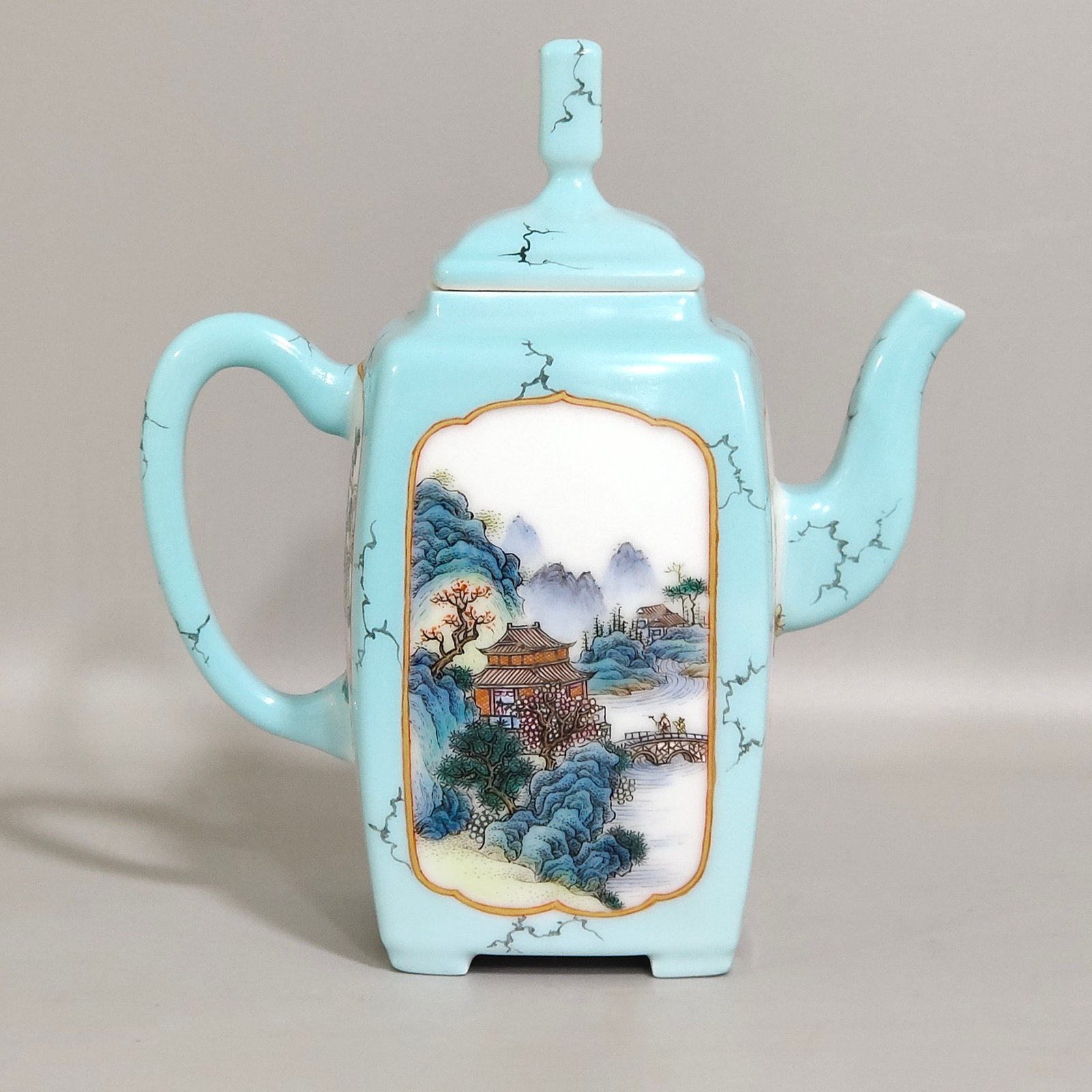 Qing Dynasty Yongzheng enamel turquoise green window landscape teapot