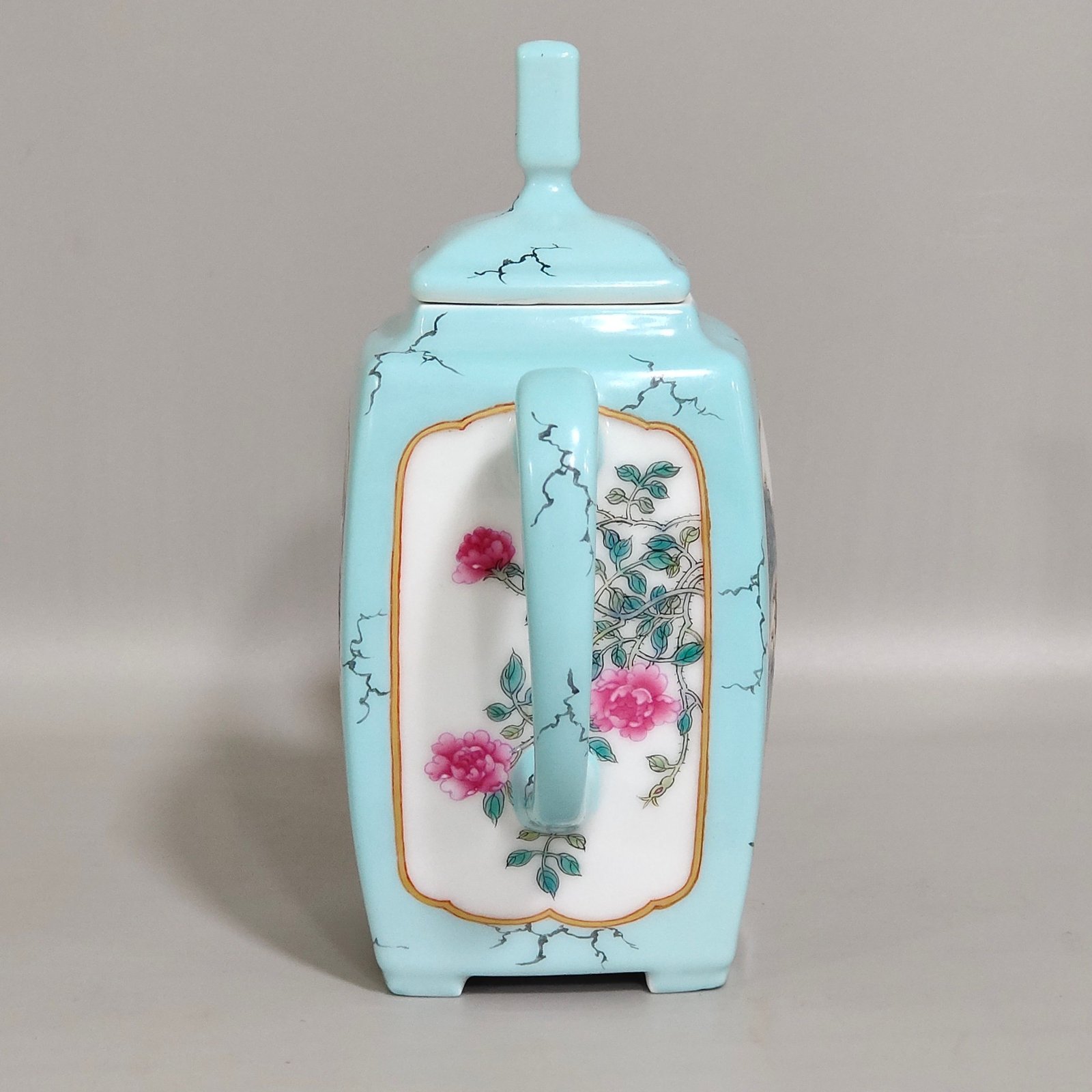 Qing Dynasty Yongzheng enamel turquoise green window landscape teapot
