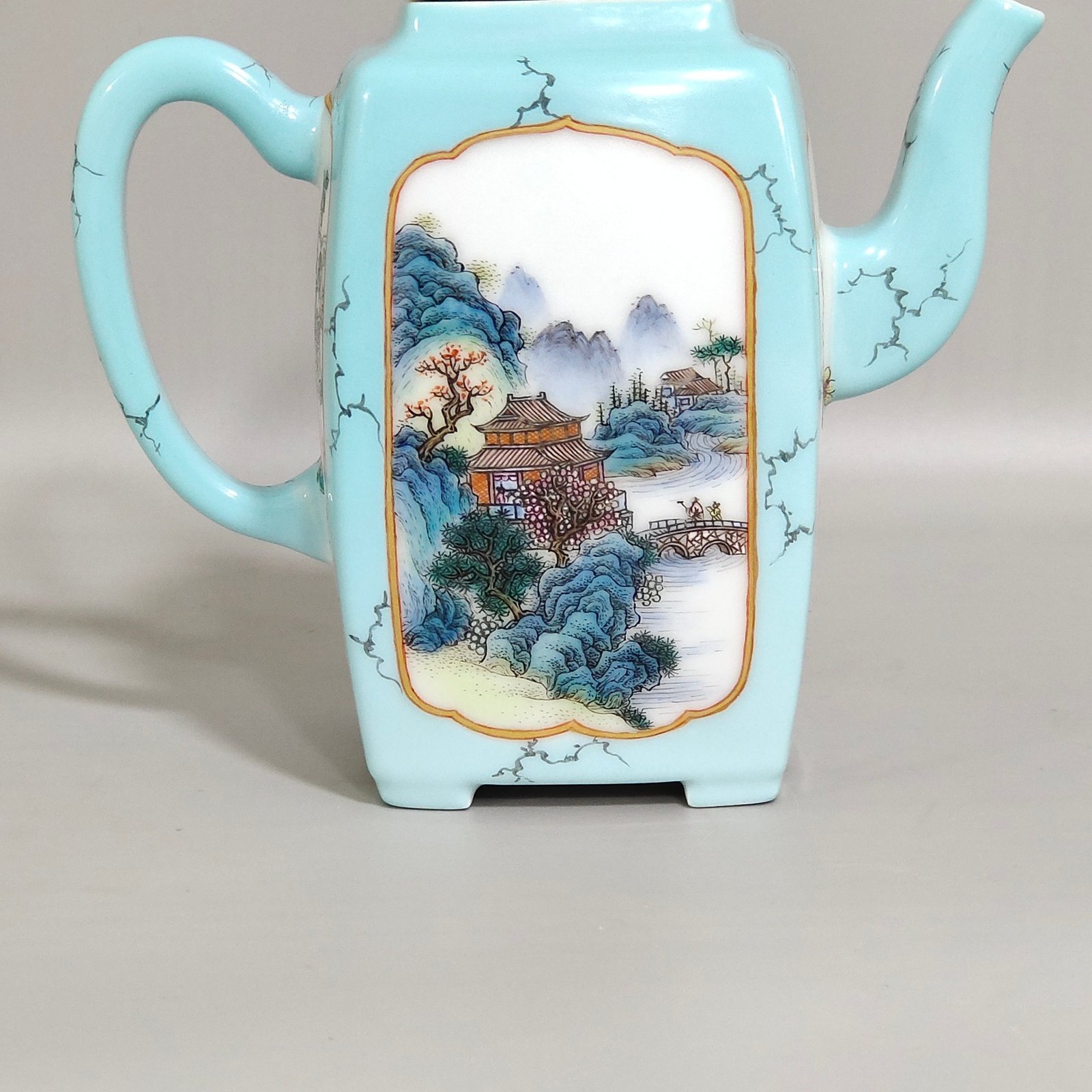 Qing Dynasty Yongzheng enamel turquoise green window landscape teapot