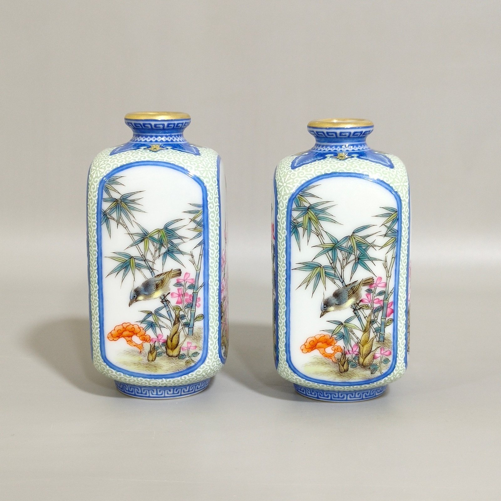 Qing Dynasty Yongzheng enamel emerald edge window four season flower snuff bottle