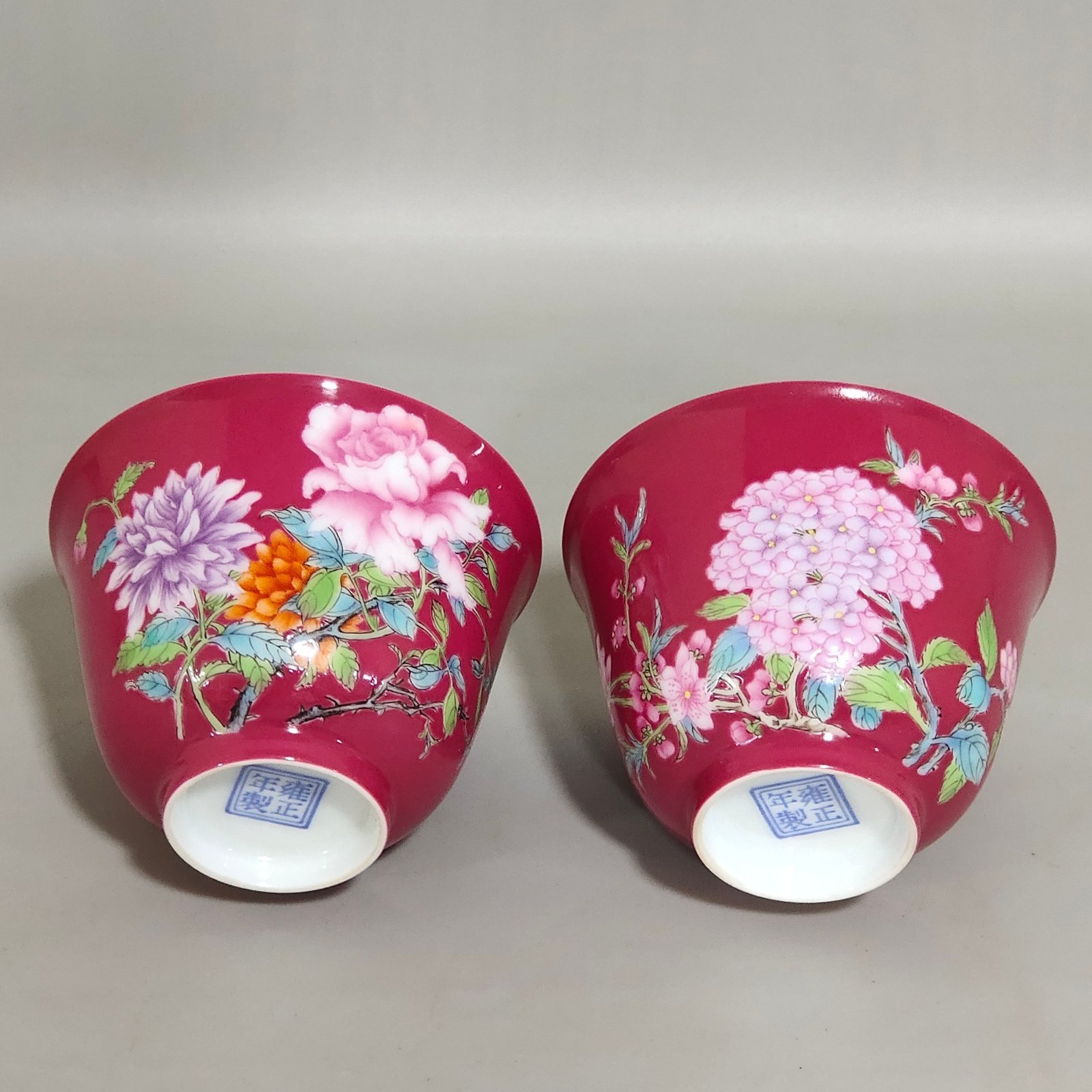 Qing Dynasty Yongzheng enamel carmine cup with twelve flowers painted inside