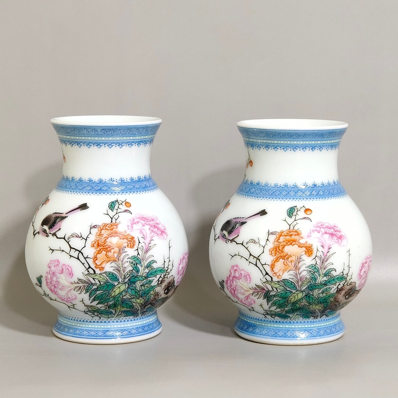 Qing Dynasty Yongzheng enamel vase with flowers birds and emerald edges and poems