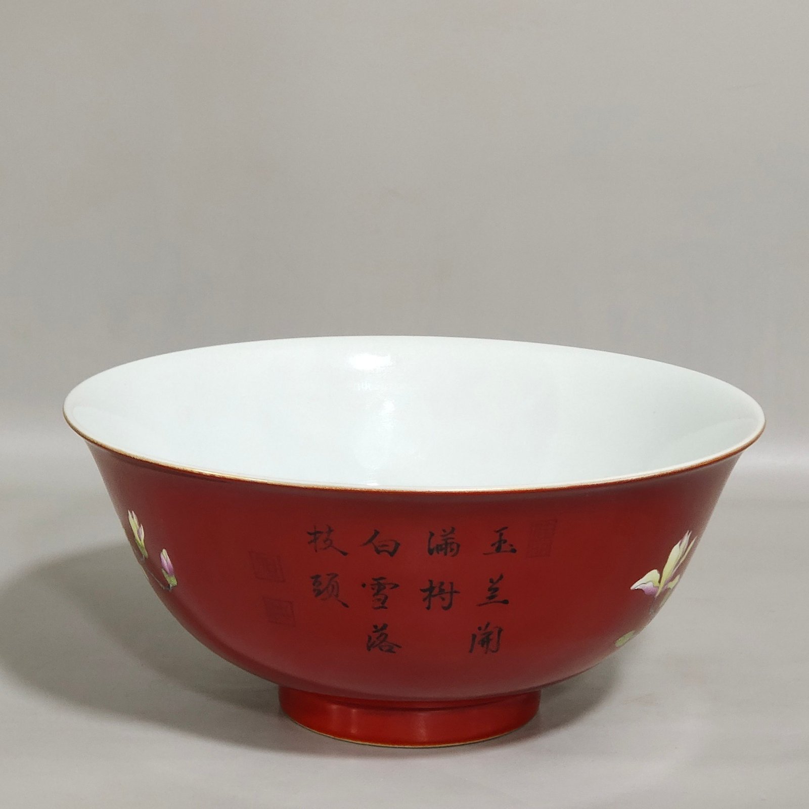 Qing Dynasty Yongzheng enamel chili red magnolia flower poem bowl