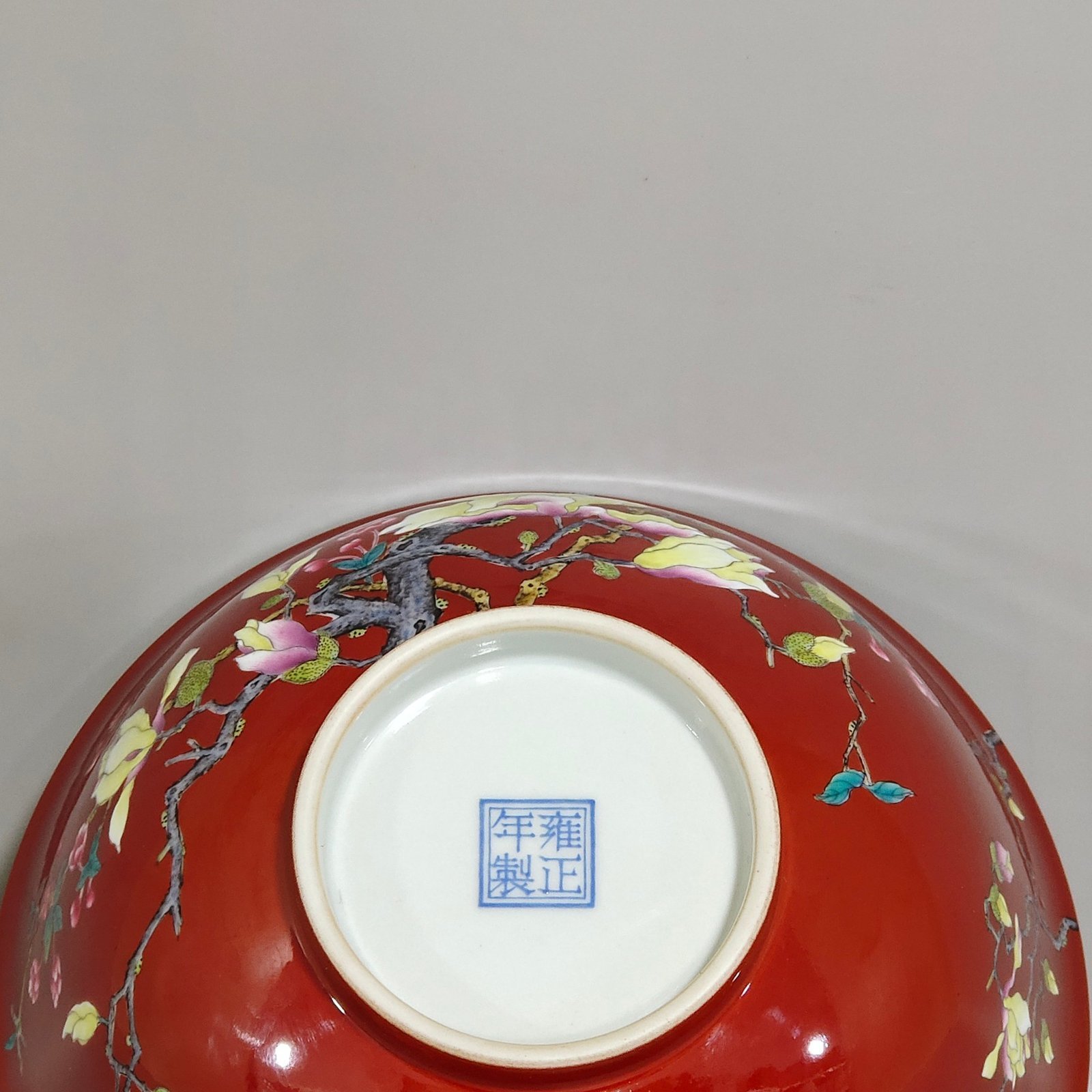 Qing Dynasty Yongzheng enamel chili red magnolia flower poem bowl