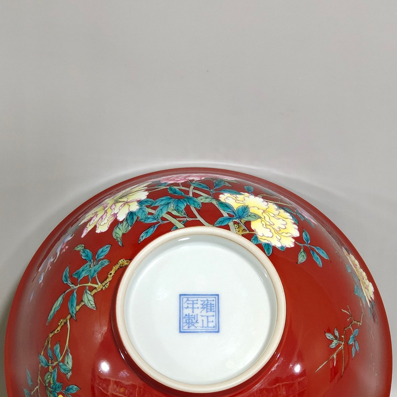 Qing Dynasty Yongzheng enamel chili red flower poem bowl