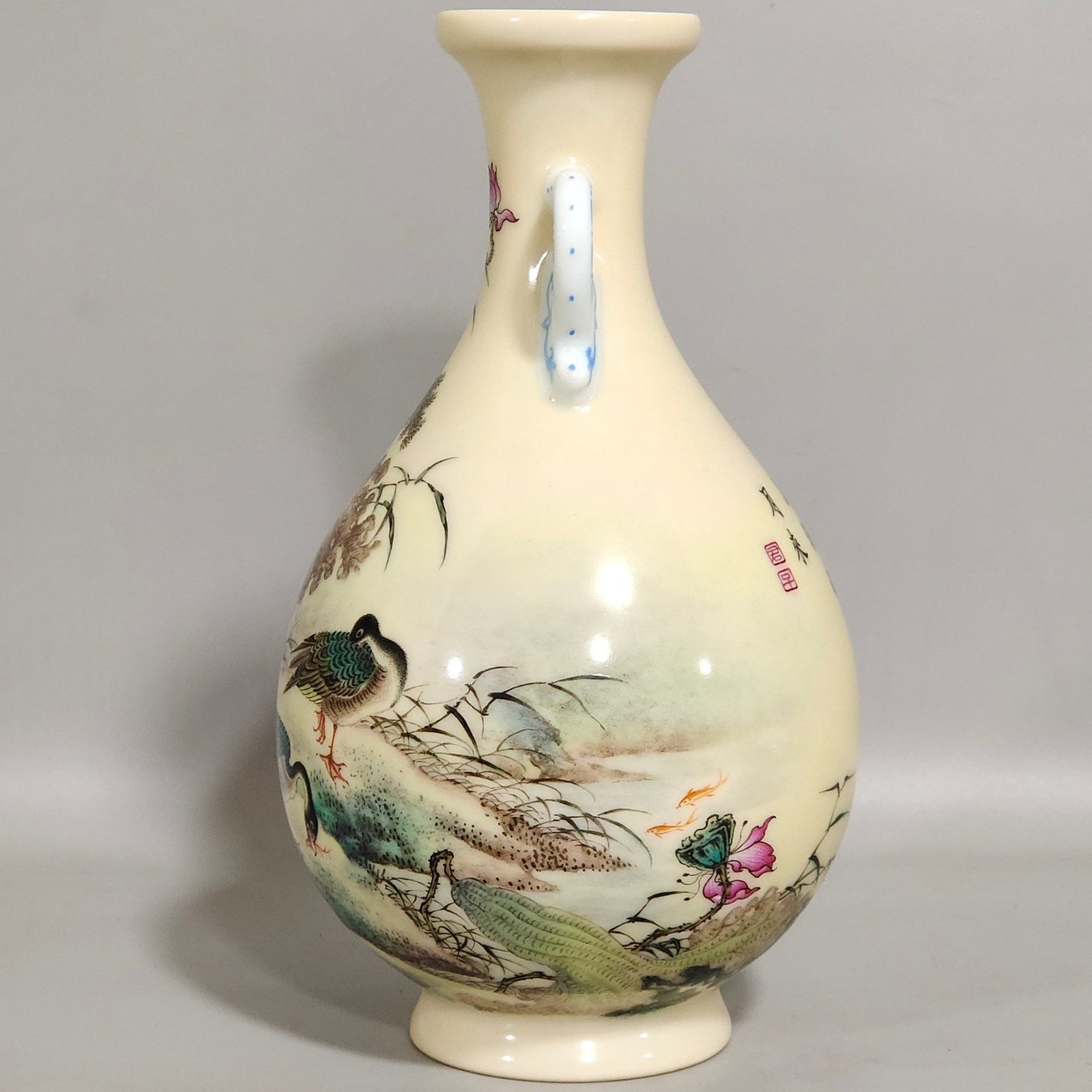 Qing Dynasty Yongzheng enamel yellow glaze double eared jade pot spring vase
