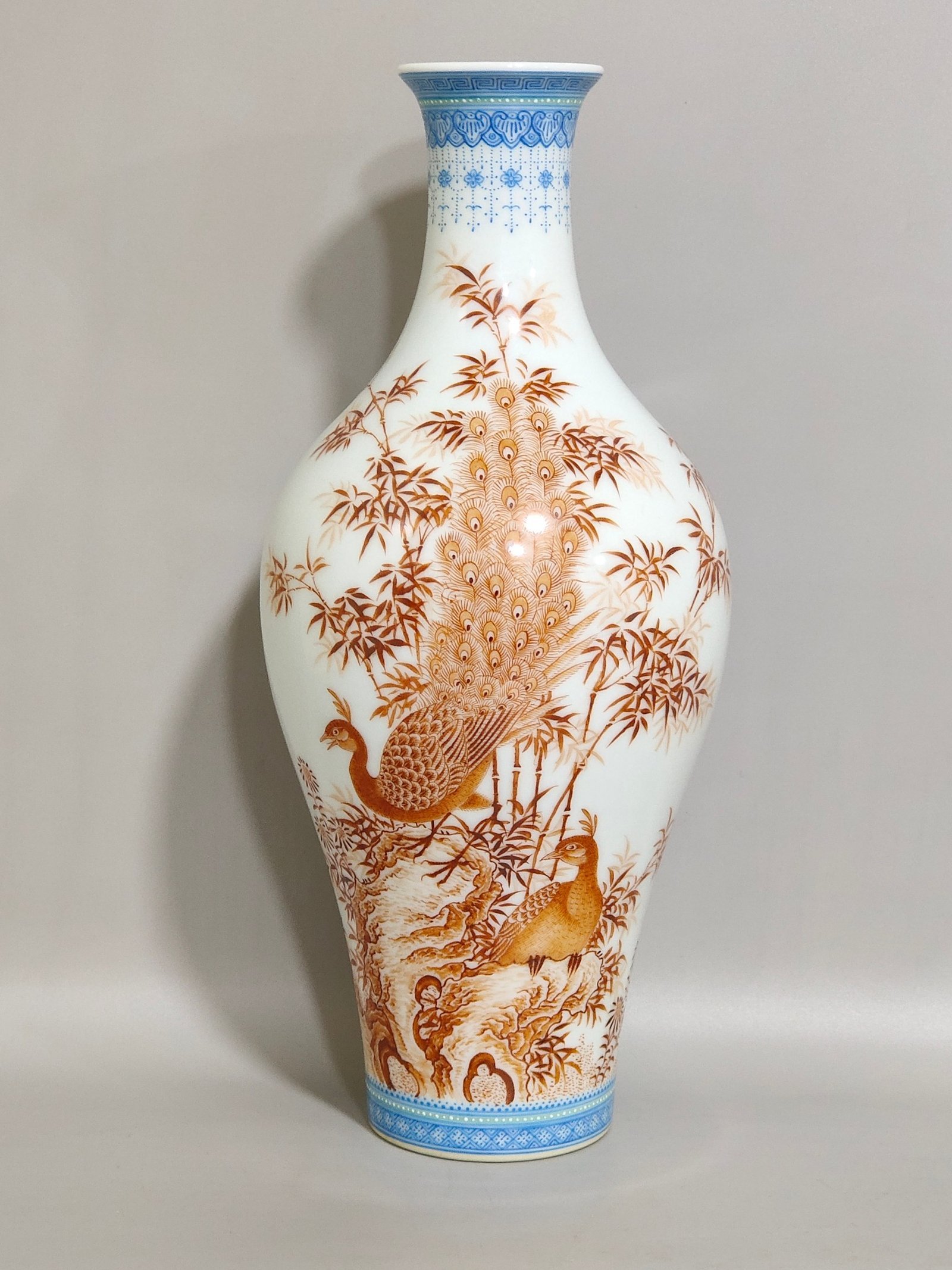 Qing Dynasty Yongzheng alum red emerald edge peacock bamboo poem inscribed olive vase